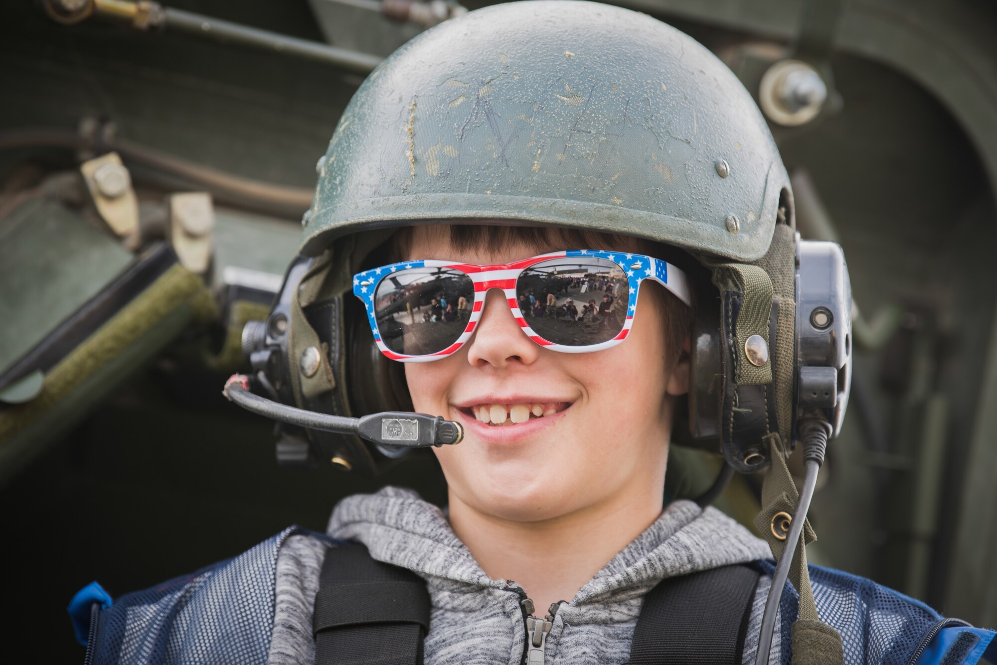 Sam, 10, son of Doug and Renee Huntman, sits in an M1126 Stryker armored vehicle during the Arctic Thunder Open House June 30, 2018. This biennial event hosted by Joint Base Elmendorf-Richardson, Alaska, is one of the largest in the state and one of the premier aerial demonstrations in the world. The event features multiple performers and ground acts to include the JBER joint forces, U.S. Air Force F-22, and U.S. Air Force Thunderbirds demonstrations teams, June 30-July 1.