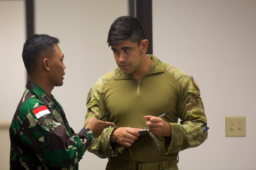 180628-M-ZO893-0121 MARINE CORPS BASE HAWAII (June 28, 2018) A Philippine Marine clears a room during urban operations training as part of Rim of the Pacific (RIMPAC) exercise aboard Marine Corps Base Hawaii June 28, 2018. RIMPAC provides high-value training for task-organized, highly-capable Marine Air-Ground Task Force and enhances the critical crisis response capability of U.S. Marines in the Pacific. Twenty-five nations, more than 45 ships and submarines, about 200 aircraft, and 25,000 personnel are participating in RIMPAC from June 27 to Aug. 2 in and around the Hawaiian Islands and Southern California. (U.S. Marine Corps photo by Sgt. Zachary Orr)