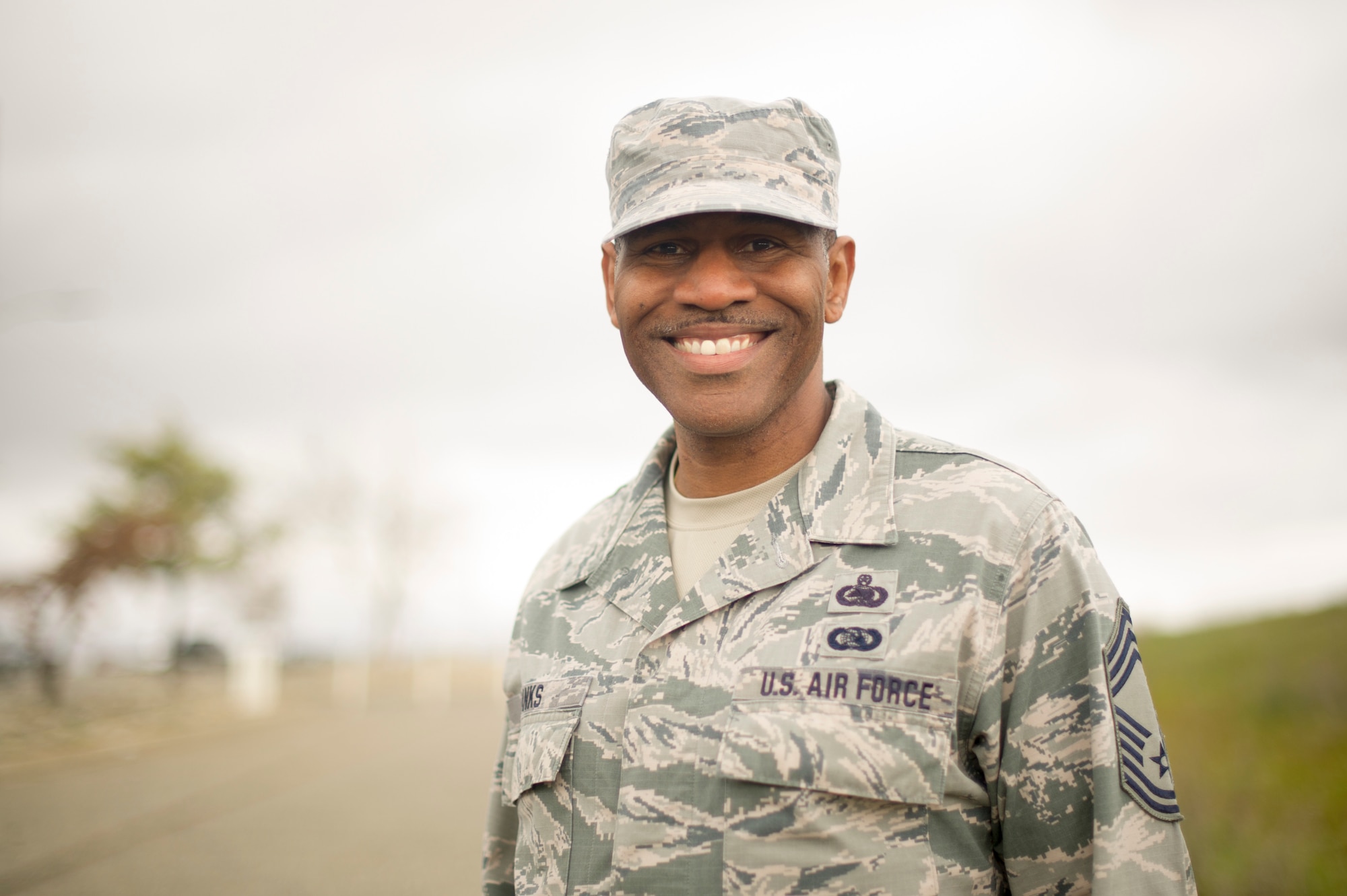 Chief Master Sgt. Martez D. Banks, 940th Operations Group superintendent, stands outside for a photo Feb. 26, at Beale Air Force Base, California.