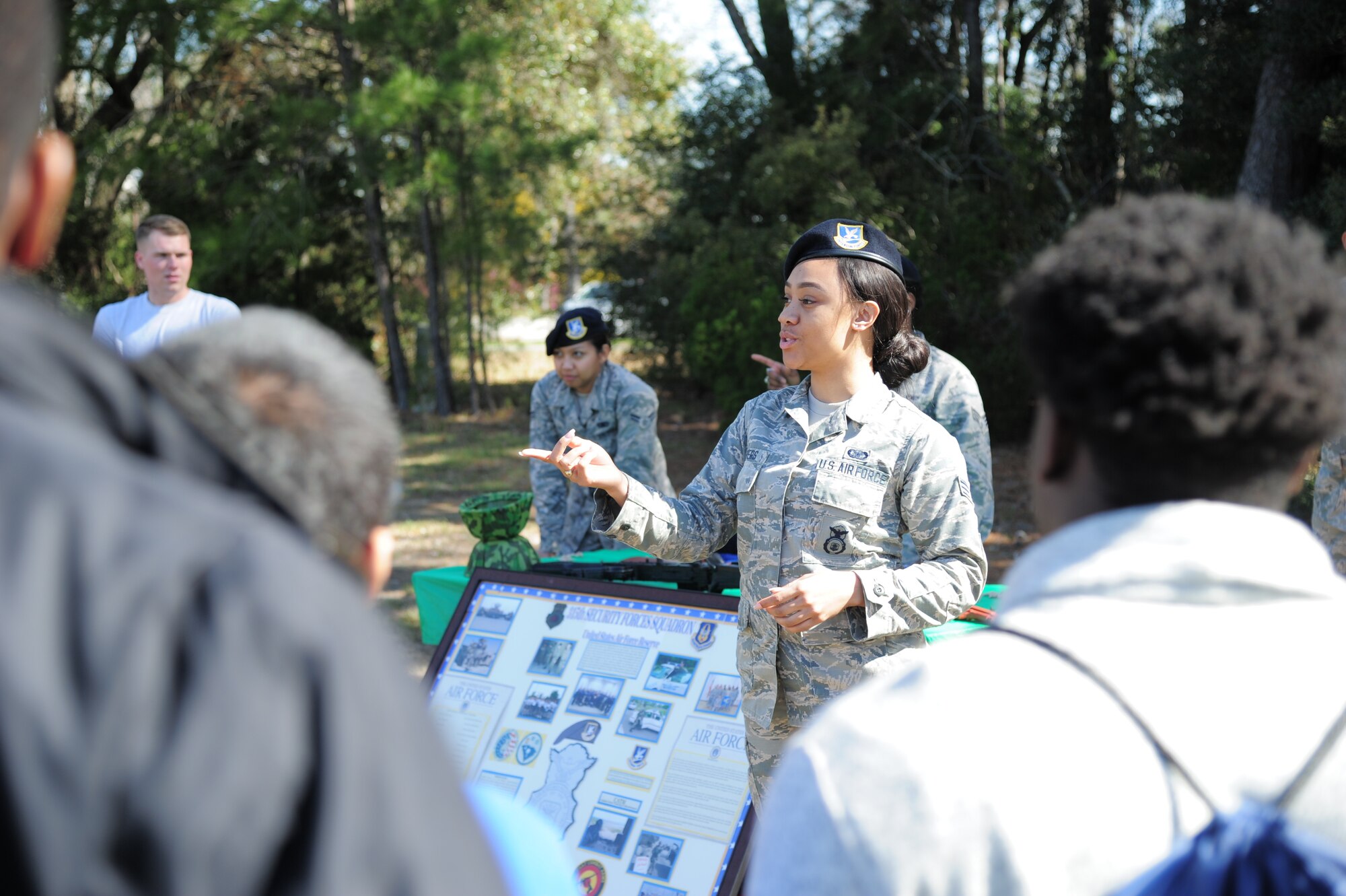 Senior Airman Denee Waters, 315th Security Forces Squadron, educates students from the Charleston area during Tuskegee Airmen Career Day, Feb. 27, 2018 at Joint Base Charleston, S.C. (U.S. Air Force photo by SrA Jonathan Lane).