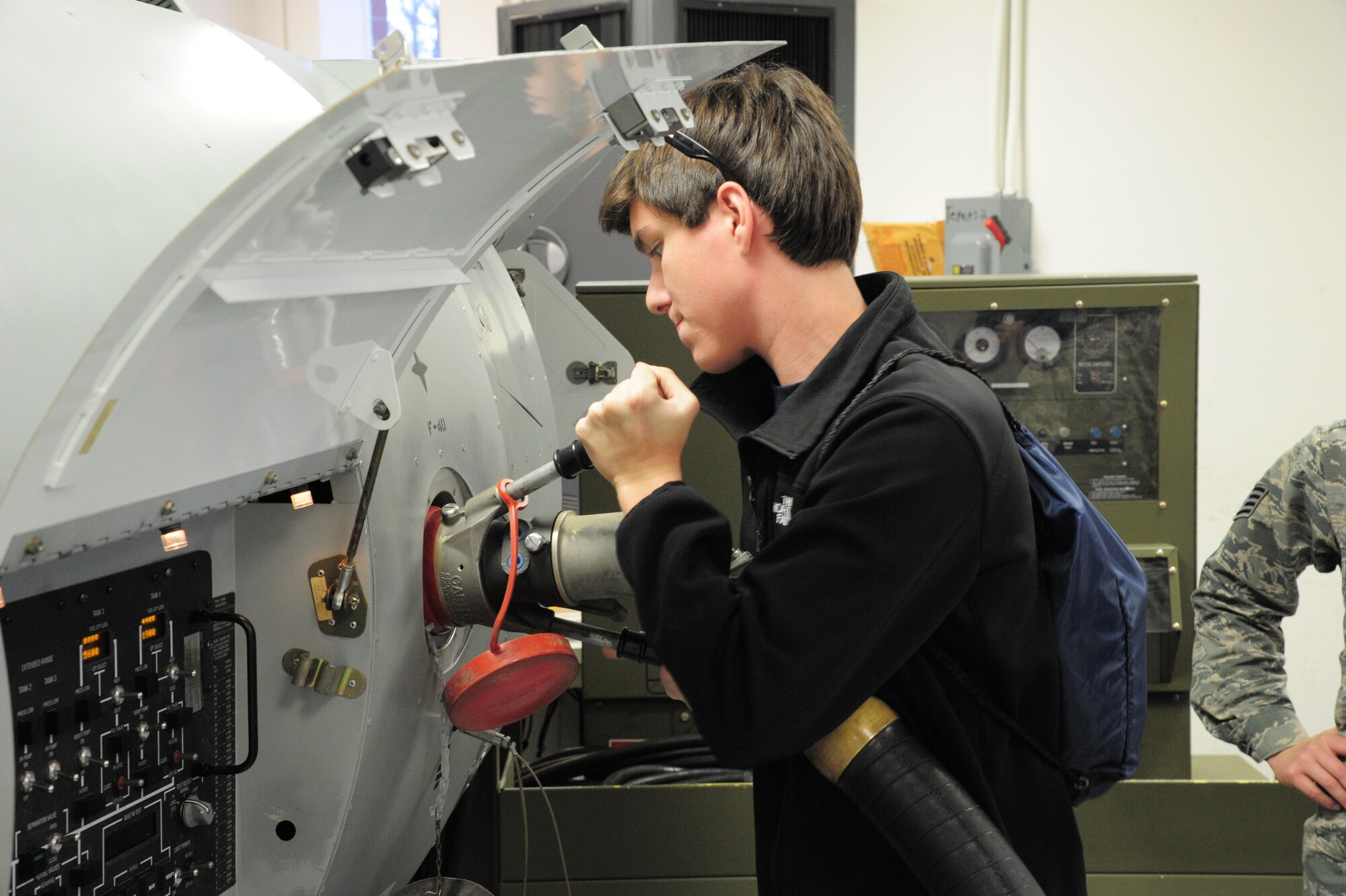 A student from the Charleston area practices refueling an aircraft in the Field Training Detachment at the 373rd Training Squadron, Detachment 5, Feb. 27, 2018 at Joint Base Charleston, S.C. (U.S. Air Force photo by SrA Jonathan Lane).