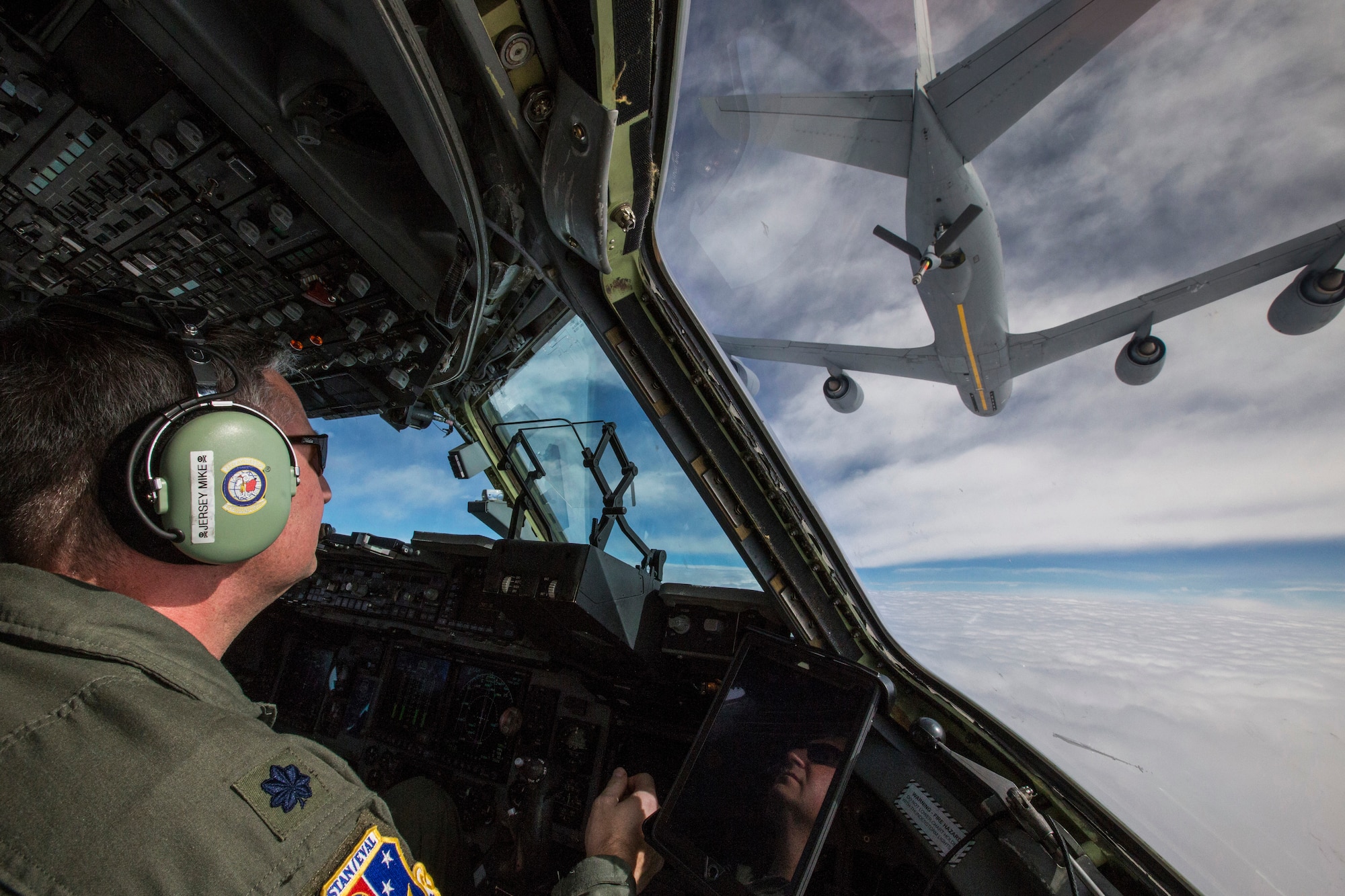 Lt. Col Michael J. Prodeline, a C-17 Globemaster III pilot with the 732nd Airlift Squadron, 514th Air Mobility Wing, maneuvers the C-17 in to be refueled by a KC-135 Stratotanker with the 157th Air Refueling Wing, New Hampshire Air National Guard, over the U.S. Feb. 22, 2018. The 514th AMW is an Air Force Reserve Command unit located at Joint Base McGuire-Dix-Lakehurst, N.J. The 157th ARW is located at Pease Air National Guard Base, N.H. (U.S. Air Force photo by Master Sgt. Mark C. Olsen)