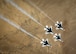 The Thunderbirds Diamond formation pilots perform the Diamond Roll maneuver over the Nevada Test and Training Range during a training flight, Feb. 28, 2018. During the training season, each pilot masters their position and maneuvers, while developing trust within the formation. (U.S. Air Force photo by Staff Sgt. Ned T. Johnston)