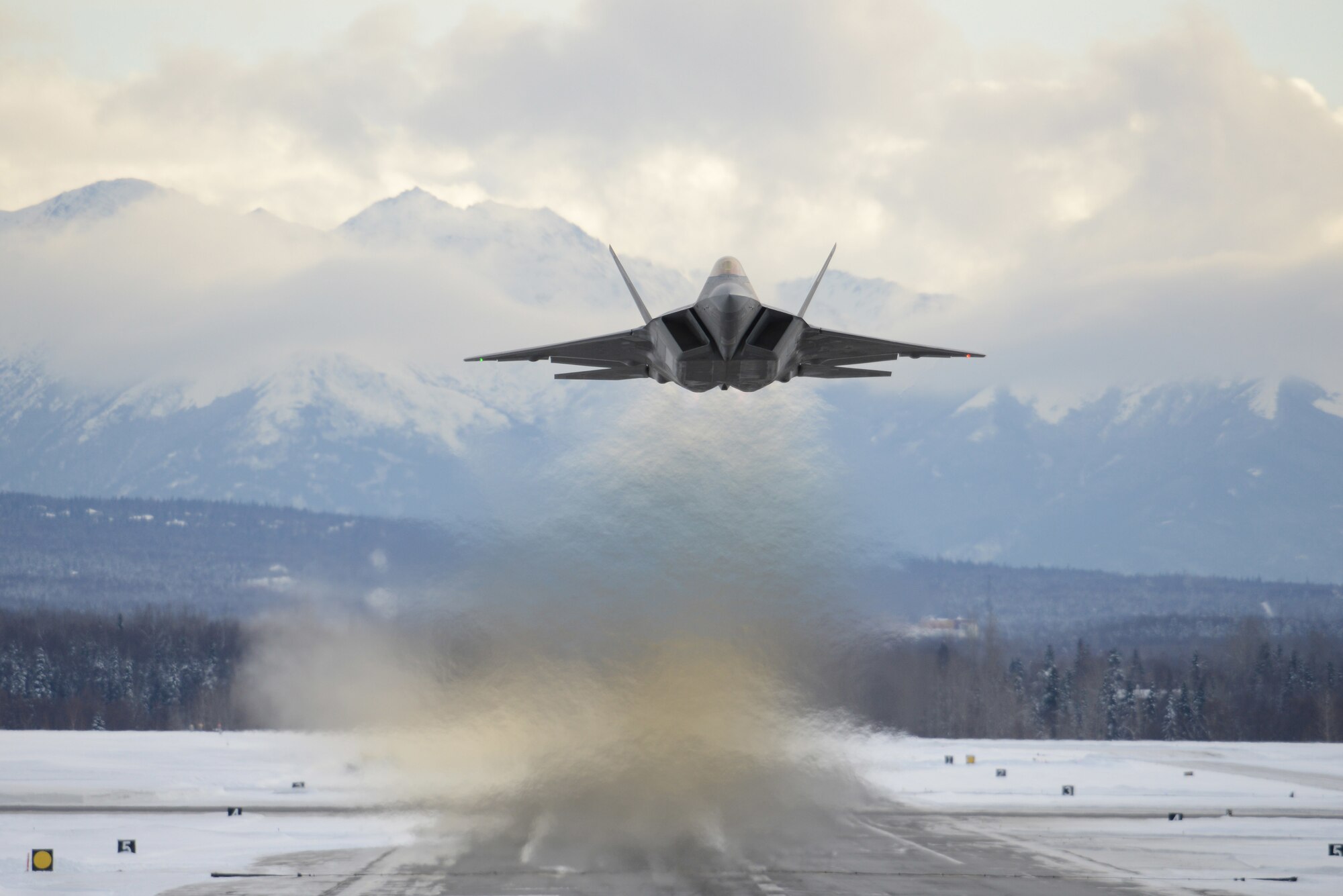An F-22 Raptor assigned to the 3rd Wing flies over Joint Base Elmendorf-Richardson, Alaska, Feb. 27, 2018. The F-22 is the Air Force’s premium fifth-generation fighter asset. (U.S. Air Force photo by Jamal Wilson)