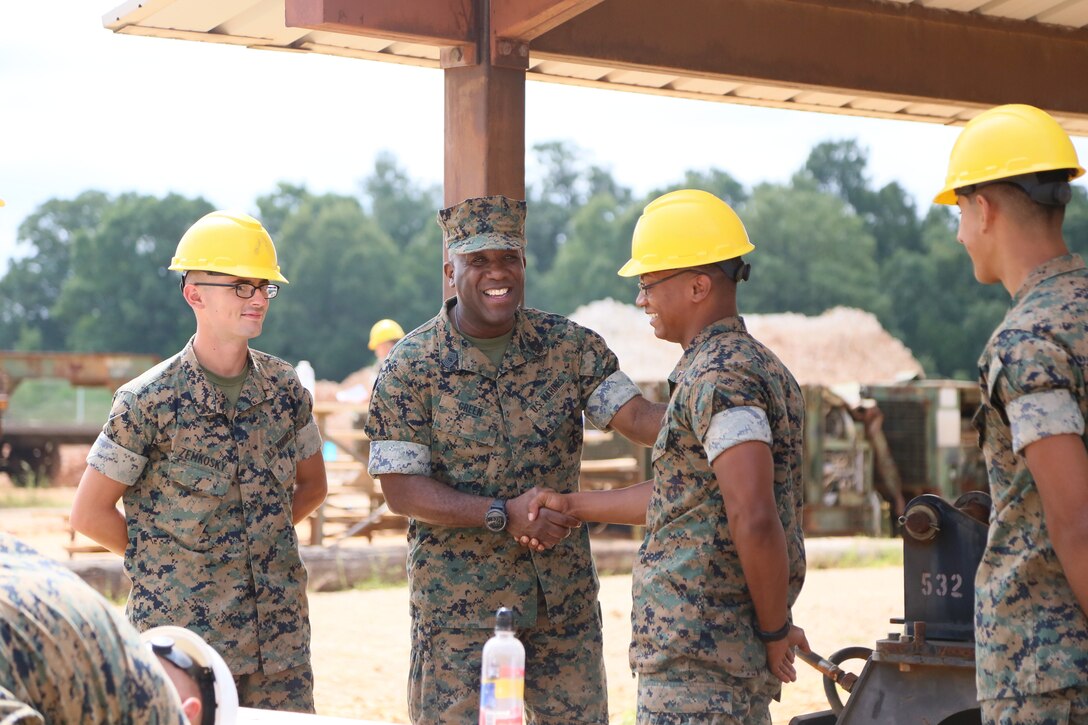 Sergeant Major of the Marine Corps Ronald L. Green greets students on Fort Leonard Wood, MO August 28th, 2017 at Engineer Equipment Instruction Company’s training area. The student’s state of well-being and continuing to learn their Military Occupational Specialty are the core for the Marine Corps future success. (U.S. Marine Corps photo by Sgt. Teng Yang)