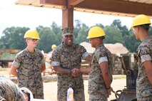 Sergeant Major of the Marine Corps Ronald L. Green greets students on Fort Leonard Wood, MO August 28th, 2017 at Engineer Equipment Instruction Company’s training area. The student’s state of well-being and continuing to learn their Military Occupational Specialty are the core for the Marine Corps future success. (U.S. Marine Corps photo by Sgt. Teng Yang)