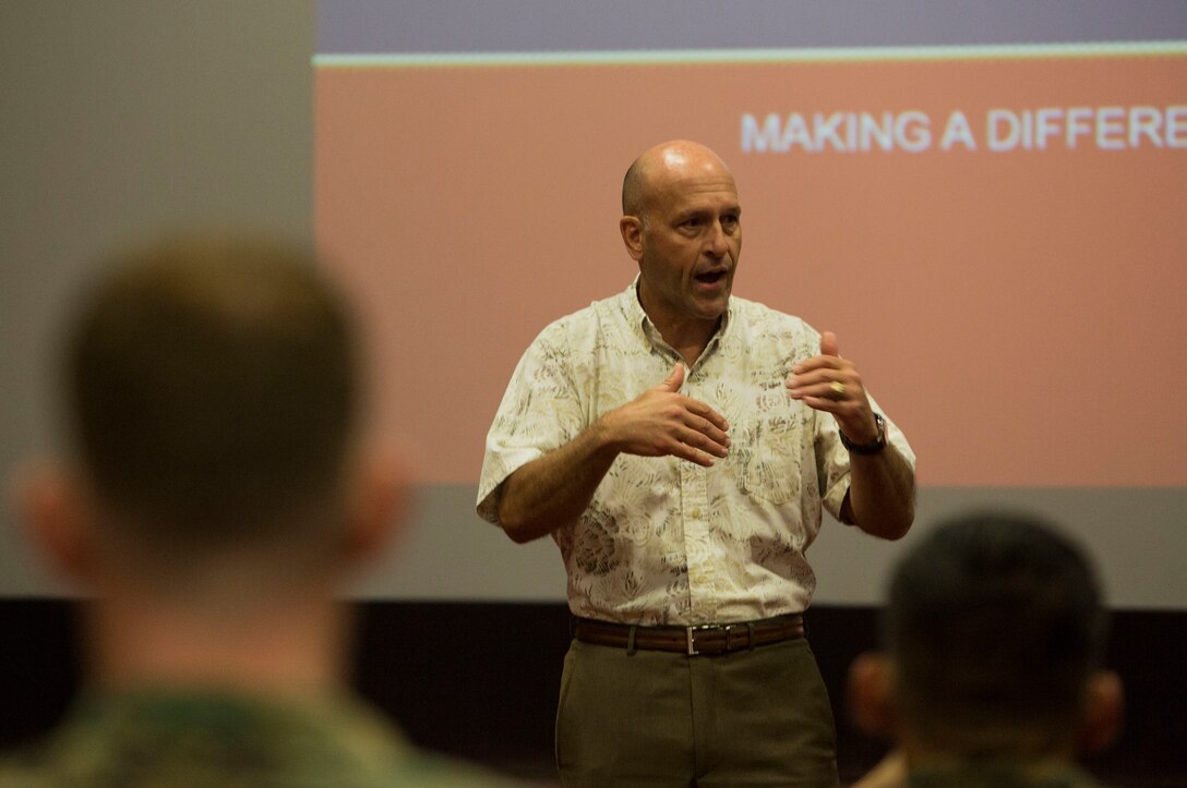 Douglas Wadsworth, Chief of Staff, Marine Corps Base Hawaii (MCBH), speaks during the active duty fund drive kickoff held by the Navy Marine Corps Relief Society (NMCRS) at the base theater, MCBH, Feb. 15, 2018. The goal of the annual fundraiser is to match donations received to aid distributed yearly, ensuring that the NMCRS can continue providing their services to Marines and Sailors in need across Oahu.  (U.S. Marine Corps photo by Lance Cpl. Luke Kuennen