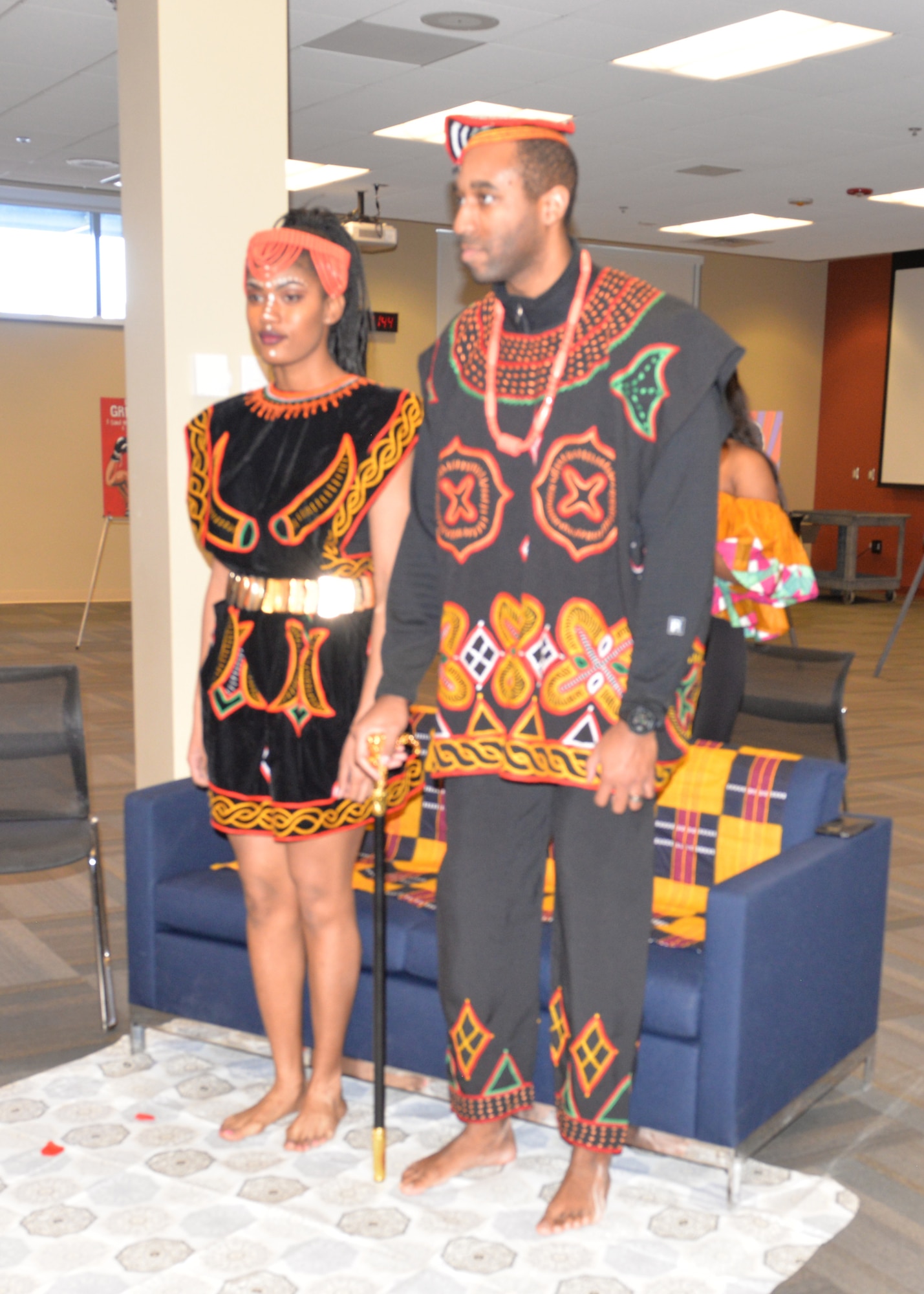 Master Sgt. Yusef Kennedy, the 28th Medical Support Squadron medical logistics flight chief, and Airman 1st Class Roymeisha Simmons, a 28th Communications Squadron cyber transport technician, played the king and queen during the first scene of the African American History Month fashion show at Ellsworth Air Force Base, S.D., Feb. 23, 2018.  Scene one displayed a mock West African wedding ceremony, and the rest of the fashion show displayed other traditional African outfits. (U.S. Air Force photo by Senior Airman Michella T. Stowers)