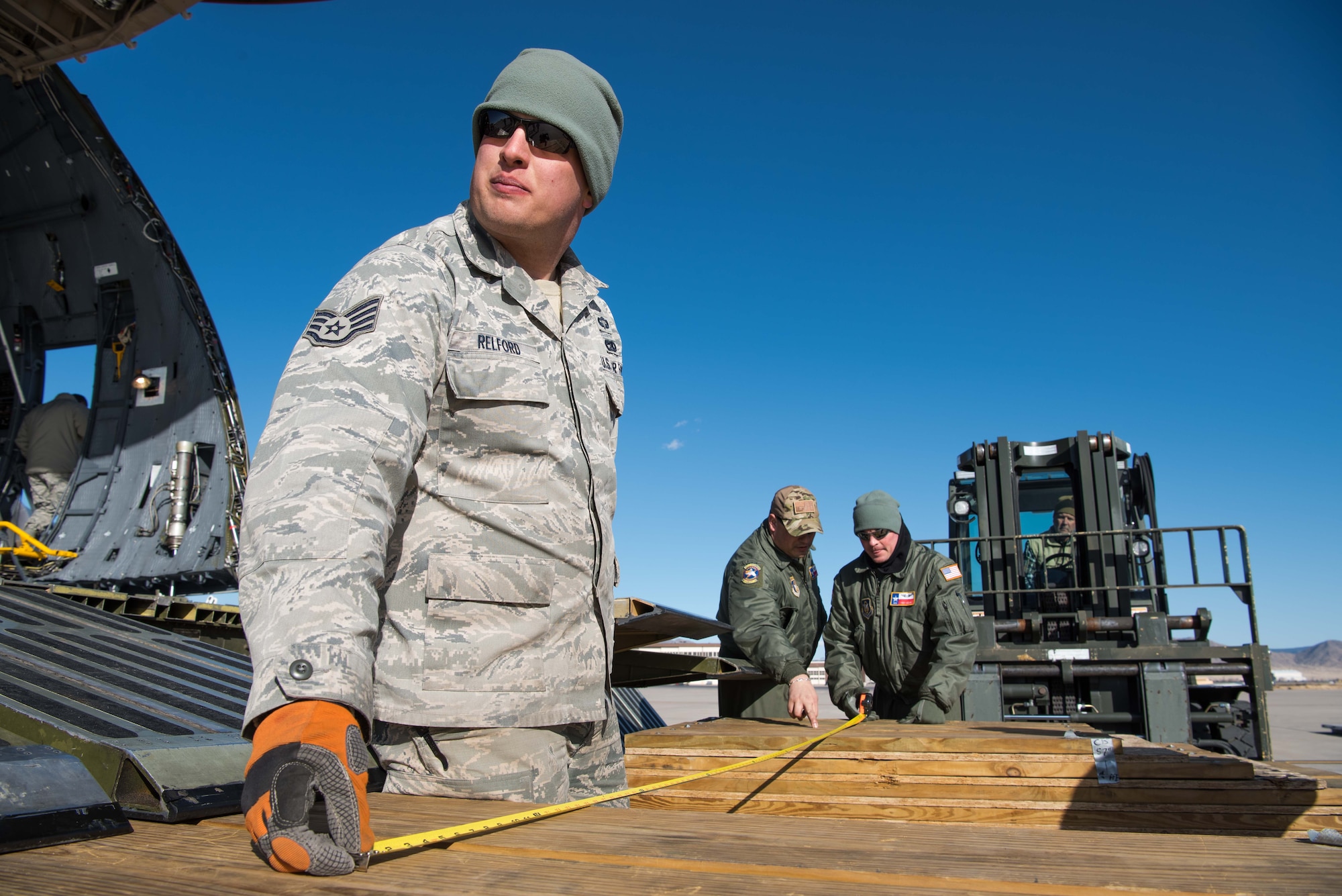 Members from multiple mission partners gathered to help load the aircraft for the Space and Missile Systems Center detachment at Kirtland. The equipment was being moved to Diego Garcia for a satellite operations mission.