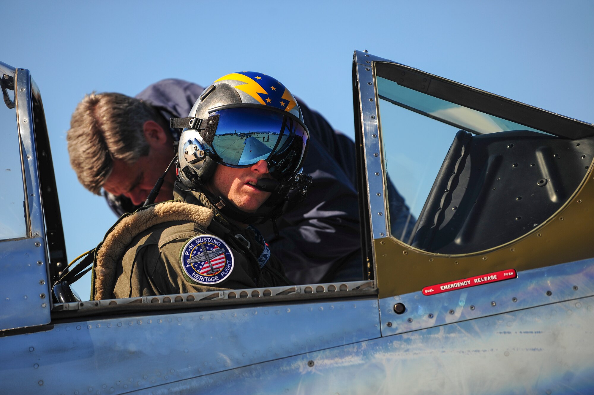 During the annual Heritage Flight Training and Certification course, aircrews practice ground and flight training to enable civilian pilots of historic military aircraft and U.S. Air Force pilots of current fighter aircraft to fly safely in formations together