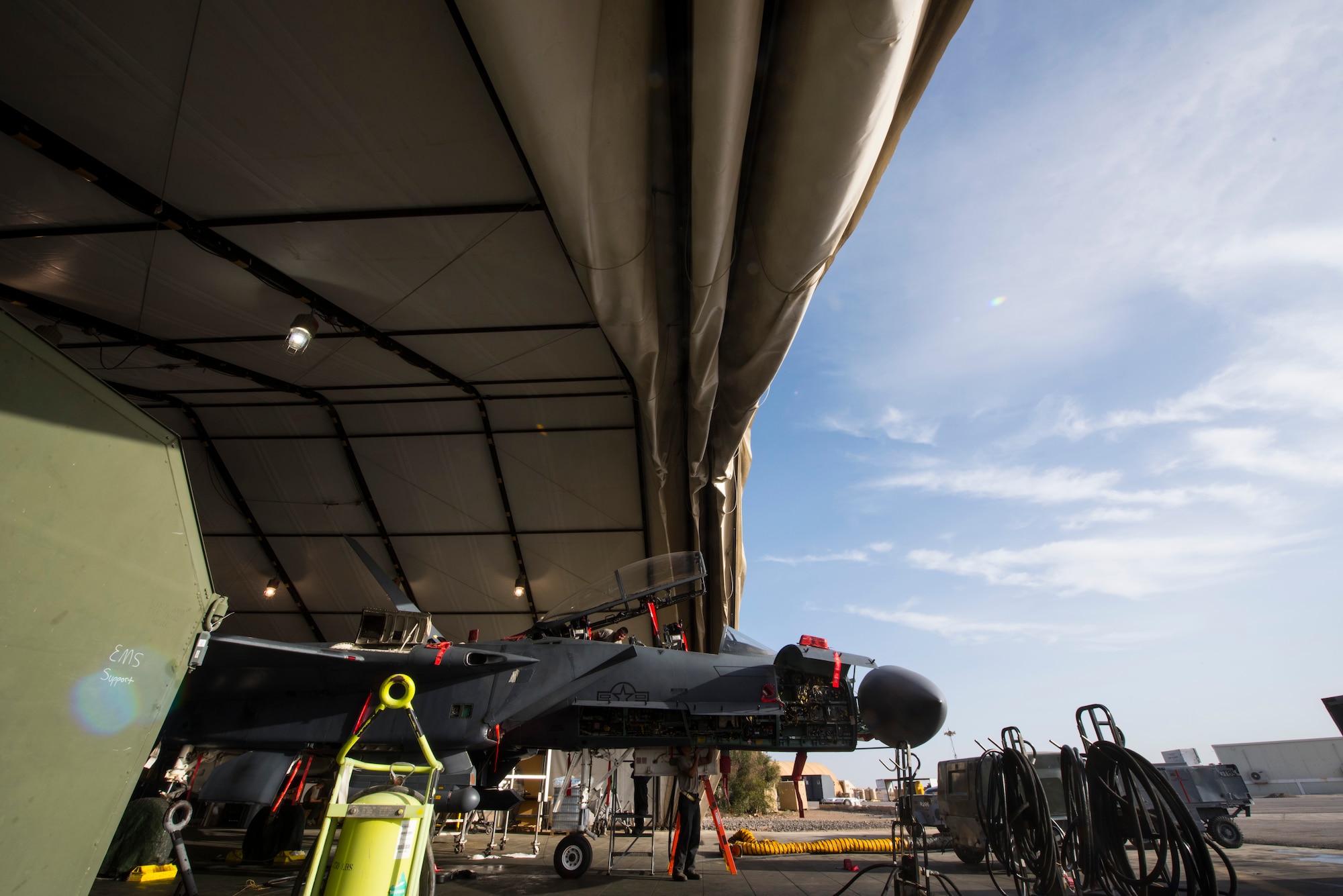 An F-15E Strike Eagle assigned to the 336th Expeditionary Fighter Squadron undergoes full phase maintenance and inspections March 1, 2018, at an undisclosed location. The 336 EFS “Rocketeers,” are deployed from Seymour Johnson Air Force Base, N.C., carrying out close-air support and defensive counter-air mission sets in support of Operation Inherent Resolve. (U.S. Air Force photo by Staff Sgt. Joshua Kleinholz)