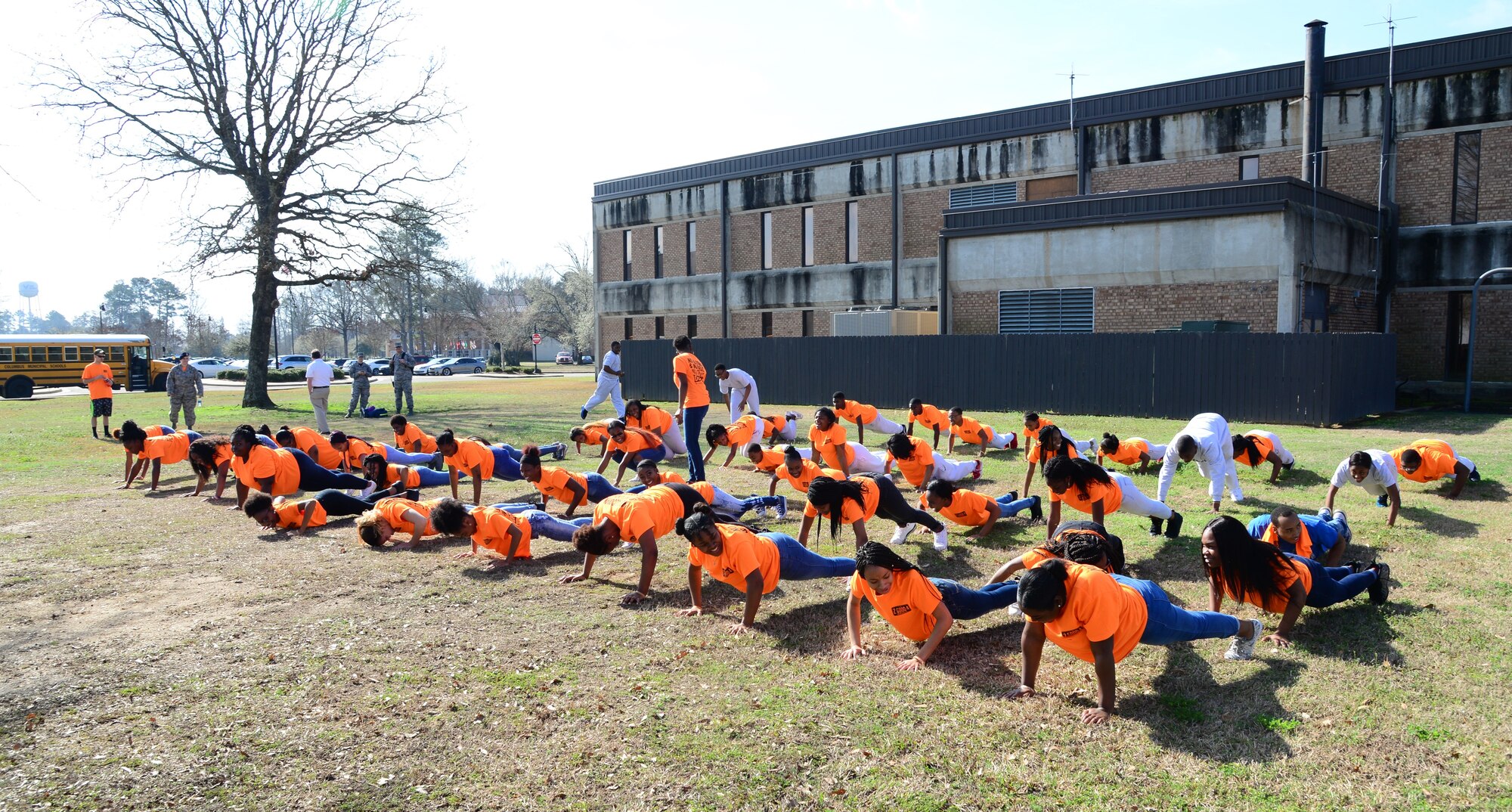 West Lowndes and Columbus High School students do push-ups Feb. 23, 2018, on Columbus Air Force Base, Mississippi. The student are enrolled in a Too Good for Drugs program, which promotes healthy living and smart life choices.  (U.S. Air Force photo by Airman 1st Class Beaux Hebert)