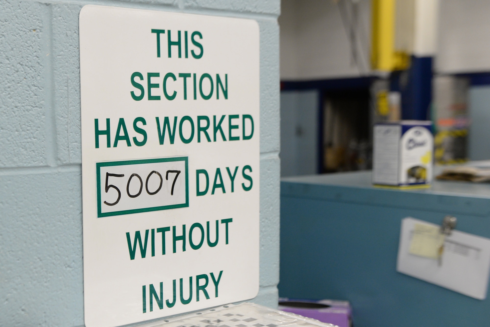 The sign displaying over 5,000 days of safety stands on display in the hydraulic shop February 27, 2018, on Altus Air Force Base, Okla. The hydraulic shop recently reached 5,000 days with no injuries or lost time due to safety incidents. (U.S. Air Force photo by Airman Jeremy Wentworth/released)