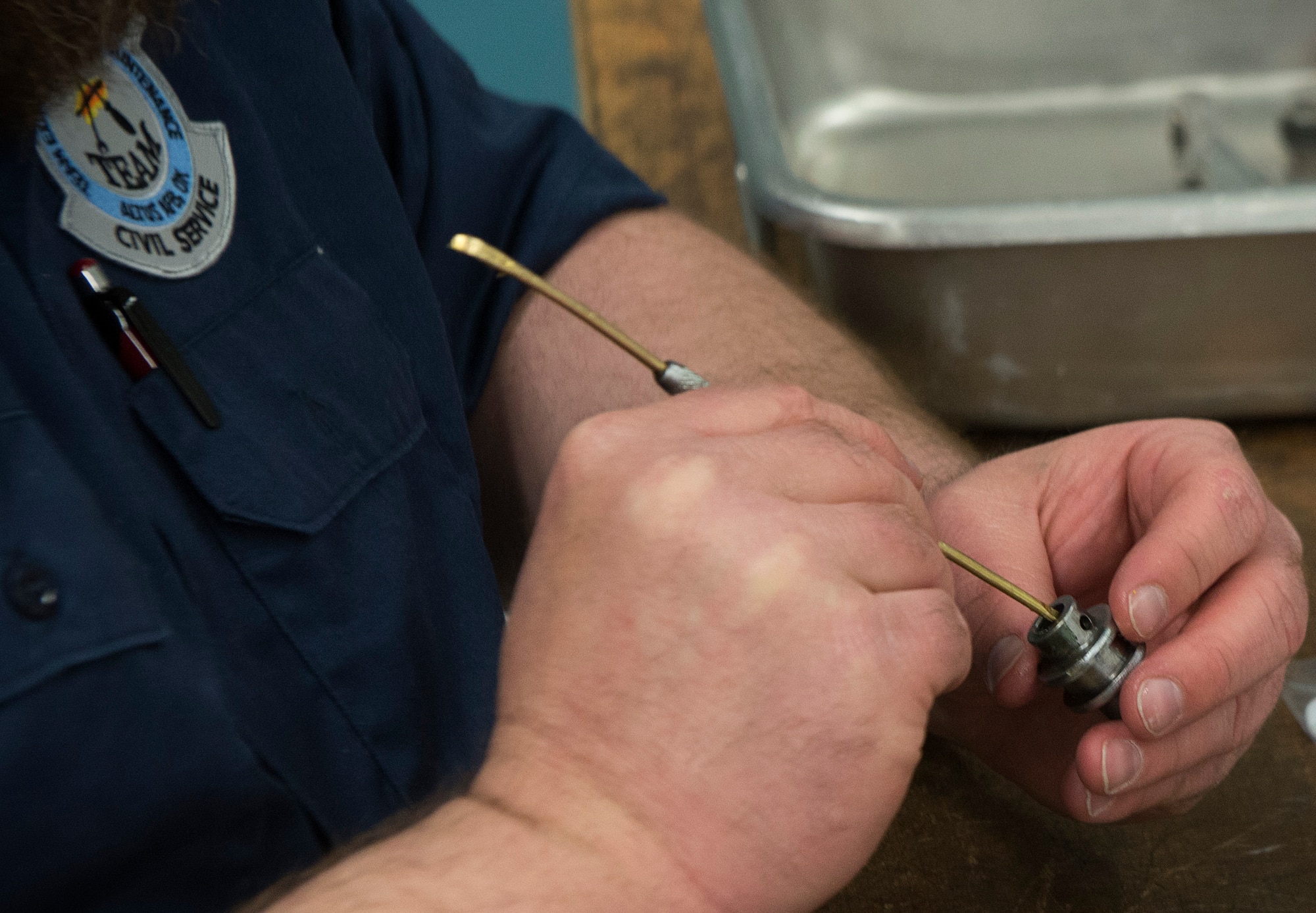 Terrell “Obie” Holley, a hydraulic technician assigned to the 97th Maintenance Group, works on an aircraft part in the hydraulic shop February 27, 2018, Altus Air Force Base, Okla. The hydraulic shop recently reached 5,000 days with no injuries or lost time due to safety incidents. (U.S. Air Force photo by Airman Jeremy Wentworth/released)