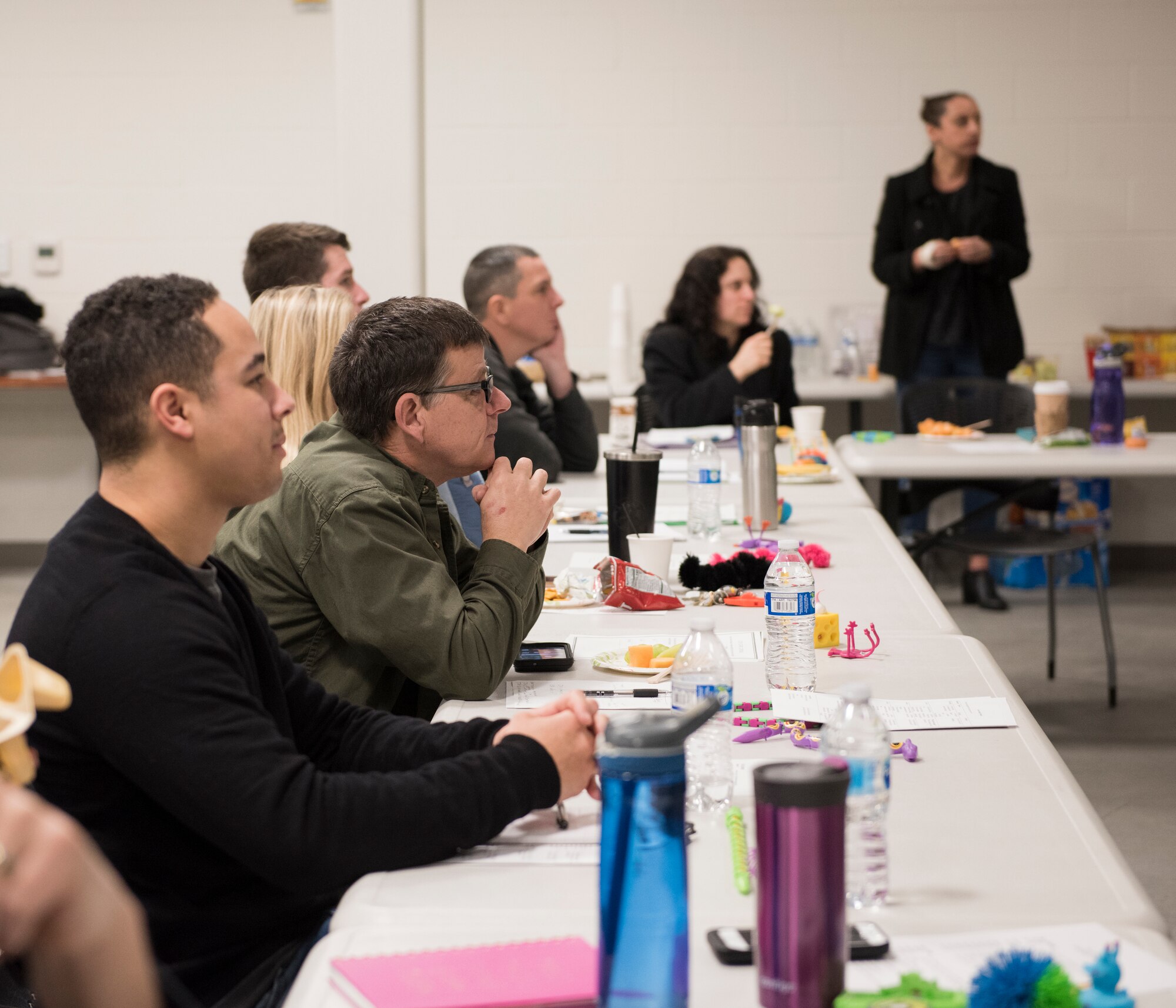 Peer-to-peer support team members in training observe a role-playing scenario January 26, 2018 at Camp Murray, Wash. The training is held over a period of two days and covers a wide range of topics like intervention, conflict resolution, substance abuse, suicide prevention, and communication skills. (U.S. Air National Guard photo by Staff Sgt. Rose M. Lust)