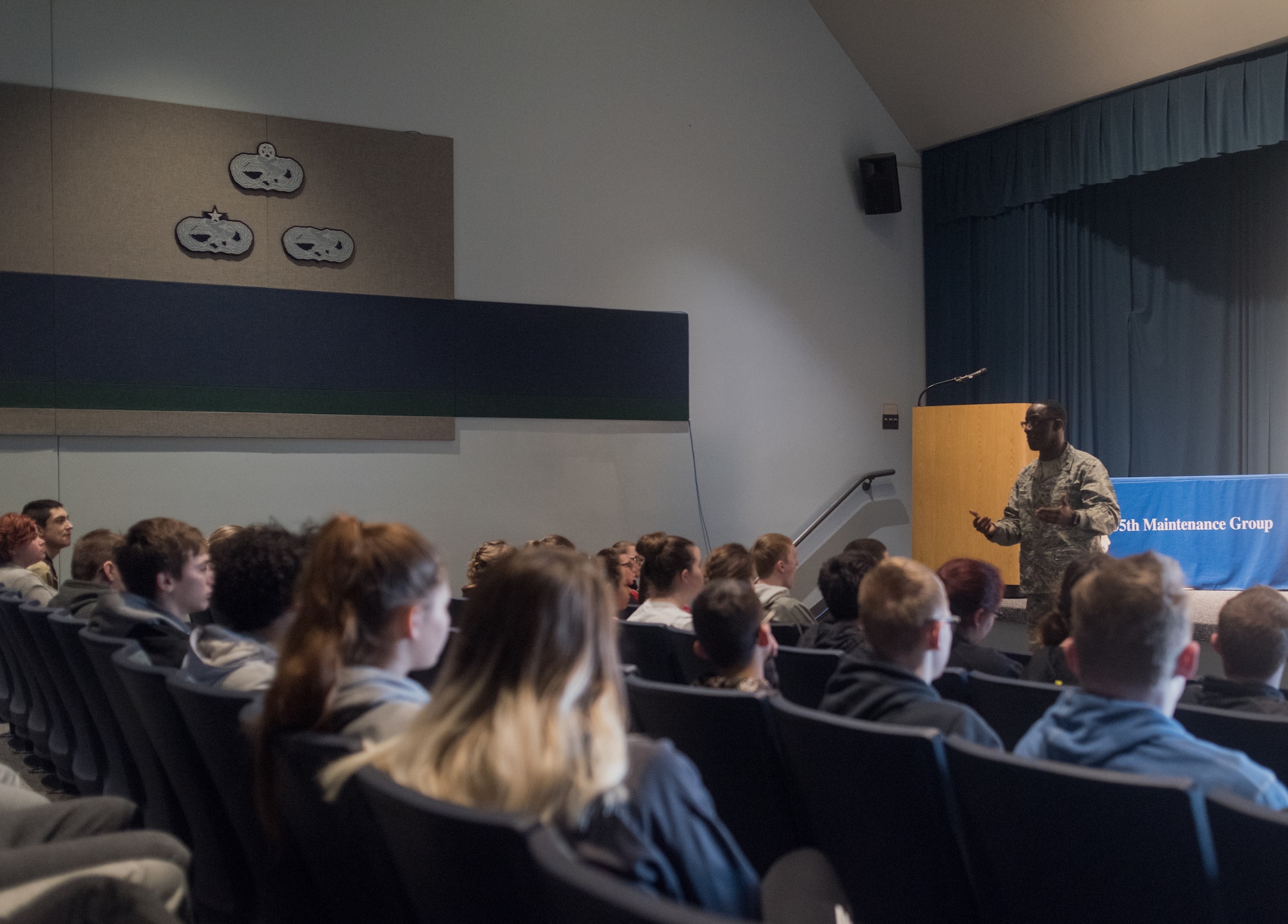 U.S. Air Force Maj. Julian Thomas, 55th Maintenance Squadron commander, speaks with students from Bellevue East High School Feb. 27, 2018 at Offutt Air Force Base, Nebraska. The tour, which was the first of its kind, provided students a chance to see into the world of aircraft maintenance and reflect on real world applications of what they’ve learned in school. (U.S. Air Force photo by Senior Airman Jacob Skovo)