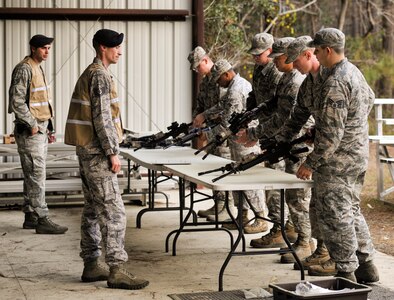 Airmen clear weapons during Mobility Exercise Bold Eagle Feb. 28, 2018, at Joint Base Charleston, S.C.