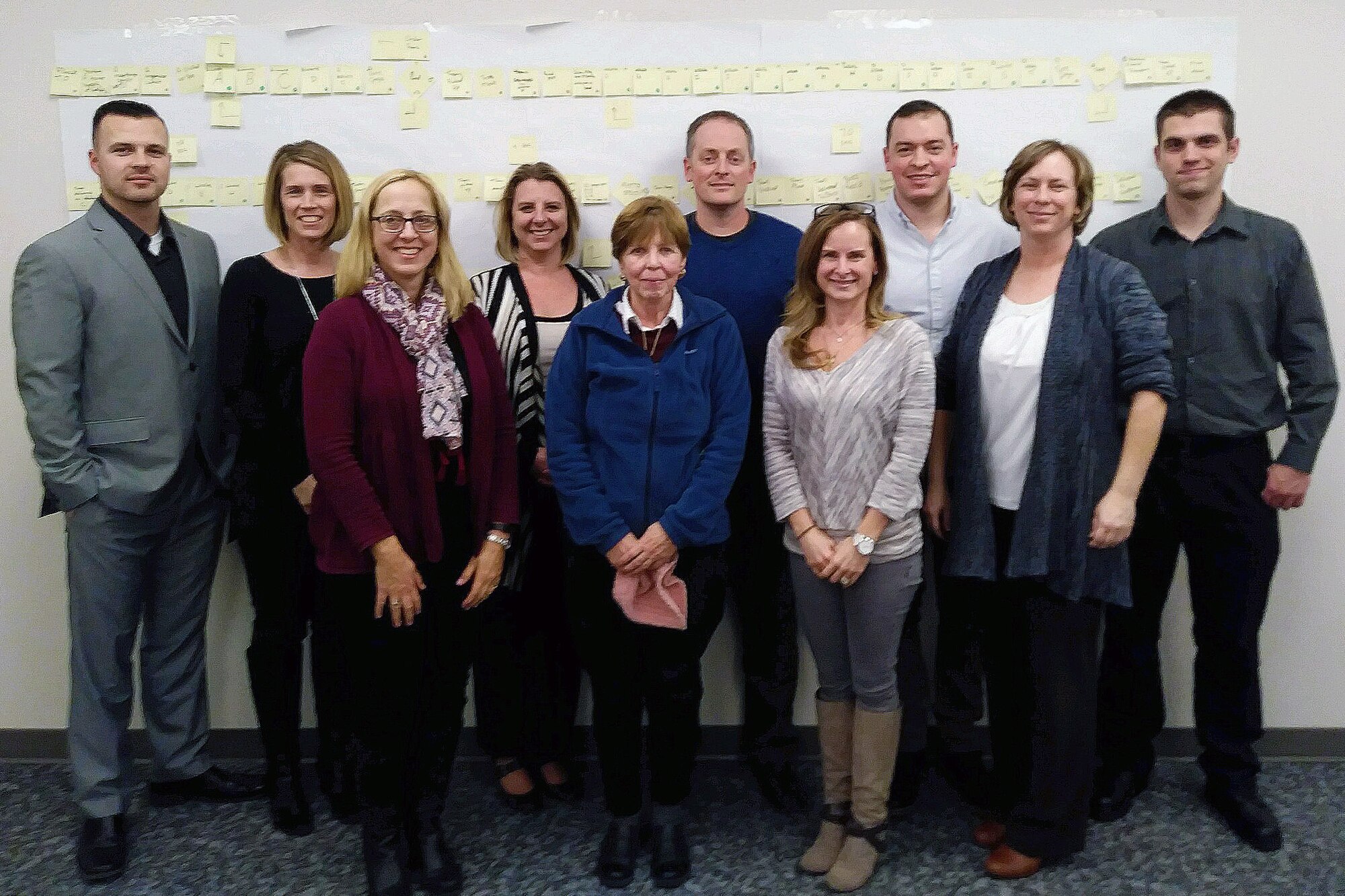 Maj. Melissa Ova poses for a group photo with her first Green Belt class at Grissom Air Reserve Base, Ind., February 1, 2018. Ova is Grissom's certified Green Belt instructor and seeks to improve workplace efficiency through innovating work processes. (U.S. Air Force photo)