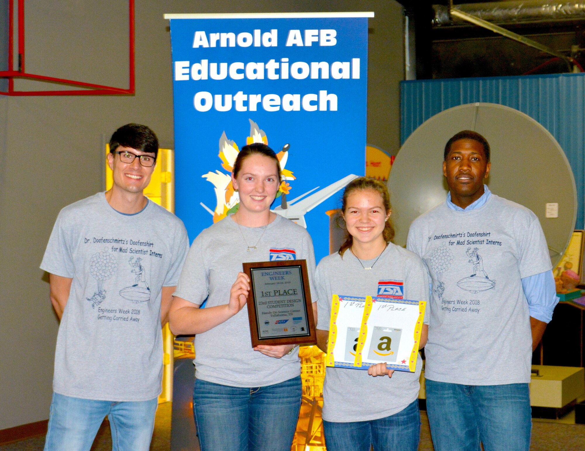During the Arnold Air Force Base Engineers Week Student Design Competition Feb. 20 at the Hands-on Science Center, Tullahoma, Alina Parks and Leanne Turpin from Franklin County High School took first place in the competition. Twenty-one, two-student teams were challenged to construct a vehicle, from provided scraps and materials, which would travel through the air while also moving around obstacles. Pictured from left is Arnold AFB engineer Rylan Cox, Parks, Turpin and Arnold engineer Jeremy Morris. (Courtesy photo)