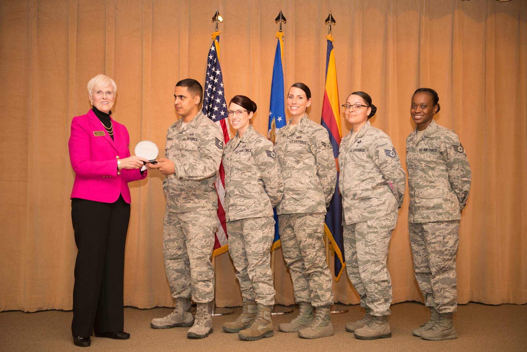 Georgia Lord, mayor of Goodyear, is presented an achievement award by the Women’s History committee during the Women’s History Month breakfast at Luke Air Force Base, Ariz., March 1, 2018. Lord spoke to a crowd of attendees during the event, which kicked off Luke’s Women’s History Month celebration. (U.S. Air Force photo/Senior Airman Ridge Shan)