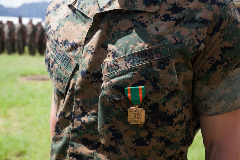 Sgt. Jeffrey Igleheart, a signals intelligence analyst with 3rd Radio Battalion, is awarded the Navy and Marine Corps Achievement Medal, Marine Corps Base Hawaii, Feb. 16, 2018. Three Marines, including Igleheart, conducted a late night search and rescue for a lost hiker in January 2018. The Marines covered 10 miles at about 3000 feet in elevation under rainy conditions, eventually finding and returning back with the hiker. (U.S. Marine Corps photo by Sgt. Jesus Sepulveda Torres)