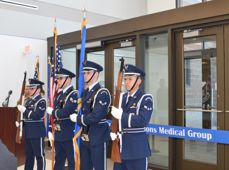The honor guard present the flags during the ceremony, Feb. 23, 2018.