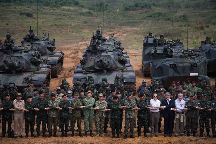 U.S. Navy Adm. Harry Harris, commander, U.S. Pacific Command, Gen. Thanchaiyan Srisuwan, Chief of Defense Forces in Thailand, and U.S. Ambassador to Thailand Glyn Davies, along with other officials, pose for a group photo after a combined arms live fire exercise during Exercise Cobra Gold 18