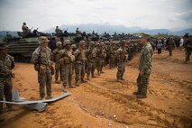 U.S. Navy Adm. Harry Harris, commander, U.S. Pacific Command, meets with U.S. Marines after a combined arms live fire exercise during Exercise Cobra Gold 18