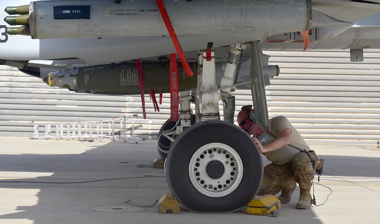 Master Sgt. John Tischhauser, 303rd Expeditionary Fighter Squadron production expeditor, prepares an A-10 Thunderbolt II for takeoff at Kandahar Airfield, Afghanistan, Feb. 27, 2018.