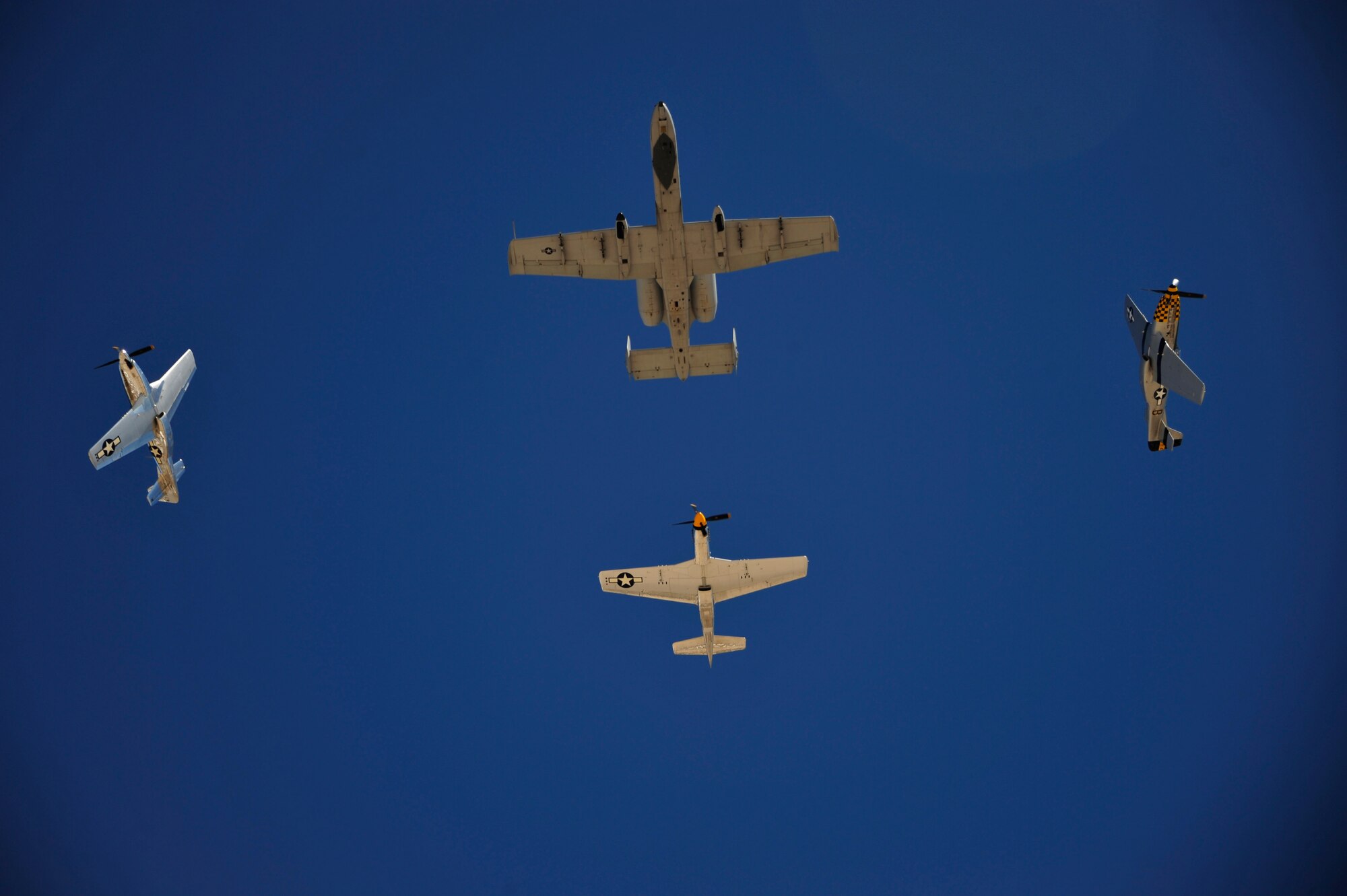 During the course, aircrews practice ground and flight training to enable civilian pilots of historic military aircraft and U.S. Air Force pilots of current fighter aircraft to fly safely in formations together.