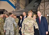 South Dakota Governor Dennis Daugaard and distinguished guests shake hands with 114th Fighter Wing Airmen during a welcome home ceremony March 4, 2018 at Joe Foss Field.