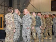 114th Fighter Wing Airmen shake hands with South Dakota’s top leadership during a welcome home ceremony March 4, 2018 at Joe Foss Field