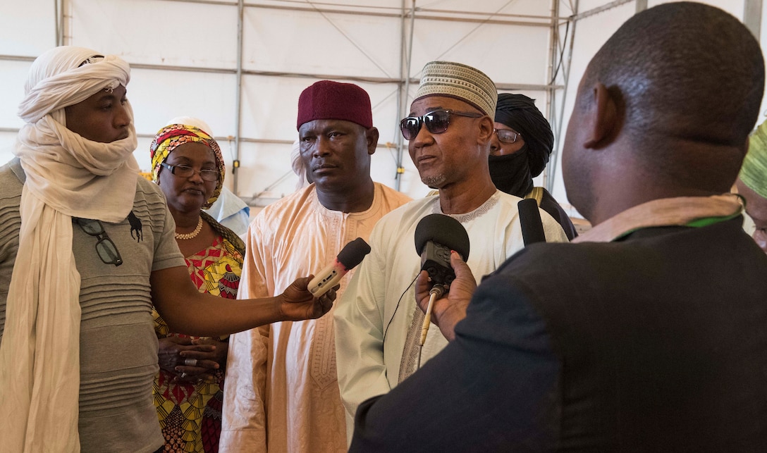 Agadez Region Governor, Saadou Soloke, speaks to local media about the mutual goals between Niger the United States Feb. 21, 2018, at Nigerien Air Base 201, Niger. After a tour of the base, Soloke reassured the media that the U.S. and Niger is working together every day to achieve the goal of ensuring peace and stability in the region. (U.S. Air Force photo by Tech. Sgt. Nick Wilson)