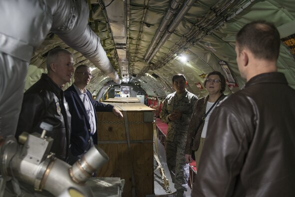 From left: Col. David Lange, 18th Air Force director of plans and strategies; Dr. Rod Miller, Air Force Global Strike Command chief scientist; Senior Airman Alexis Suarez, 375th Wing Staff Agency unit deployment manager; and Dr. Donna Senft, Air Mobility Command chief scientist, discuss the KC-135 Stratotanker mission with Maj. Andrew Hale, 906th Air Refueling Squadron aircraft commander, before an aerial refueling flight Feb. 28, 2018, at Scott Air Force Base, Illinois. (U.S. Air Force photo by Airman 1st Class Tara Stetler)