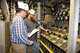 Ryan Allen, at right, a lead test operations engineer, and Troy Stokes, lead outside machinist, set up a GN2 panel for system checkouts prior to a test in one of the jet engine test facilities at Arnold Air Force Base. In his position as operations engineer, Allen leads and coordinates activities of the test cell, plant and test article during a test. (U.S. Air Force photos/Deidre Ortiz)