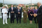 Admiral Harry Harris, along with Ambassador Scott Brown, New Zealand Minister of Defence, Hon. Ron Mark and Chief of the New Zealand Defence Force, Lt. Gen. Tim Keating each hold Mauri stones while Peter Jackson blesses the site of the United States Memorial, which will be installed at Pukeahu National War Memorial Park this year.