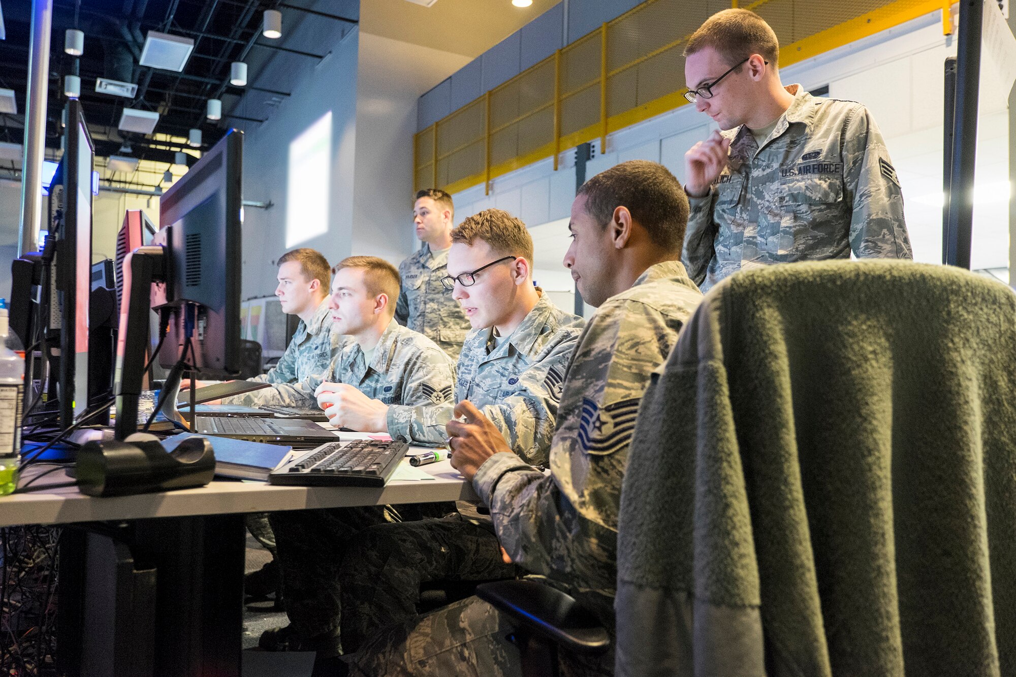 Members of a Cyber Mission Defense Team from Scott participate in the annual Red Flag exercise at Nellis Air Force Base, Nevada. The exercise helps build the skills necessary to defend an Air Operations Center.