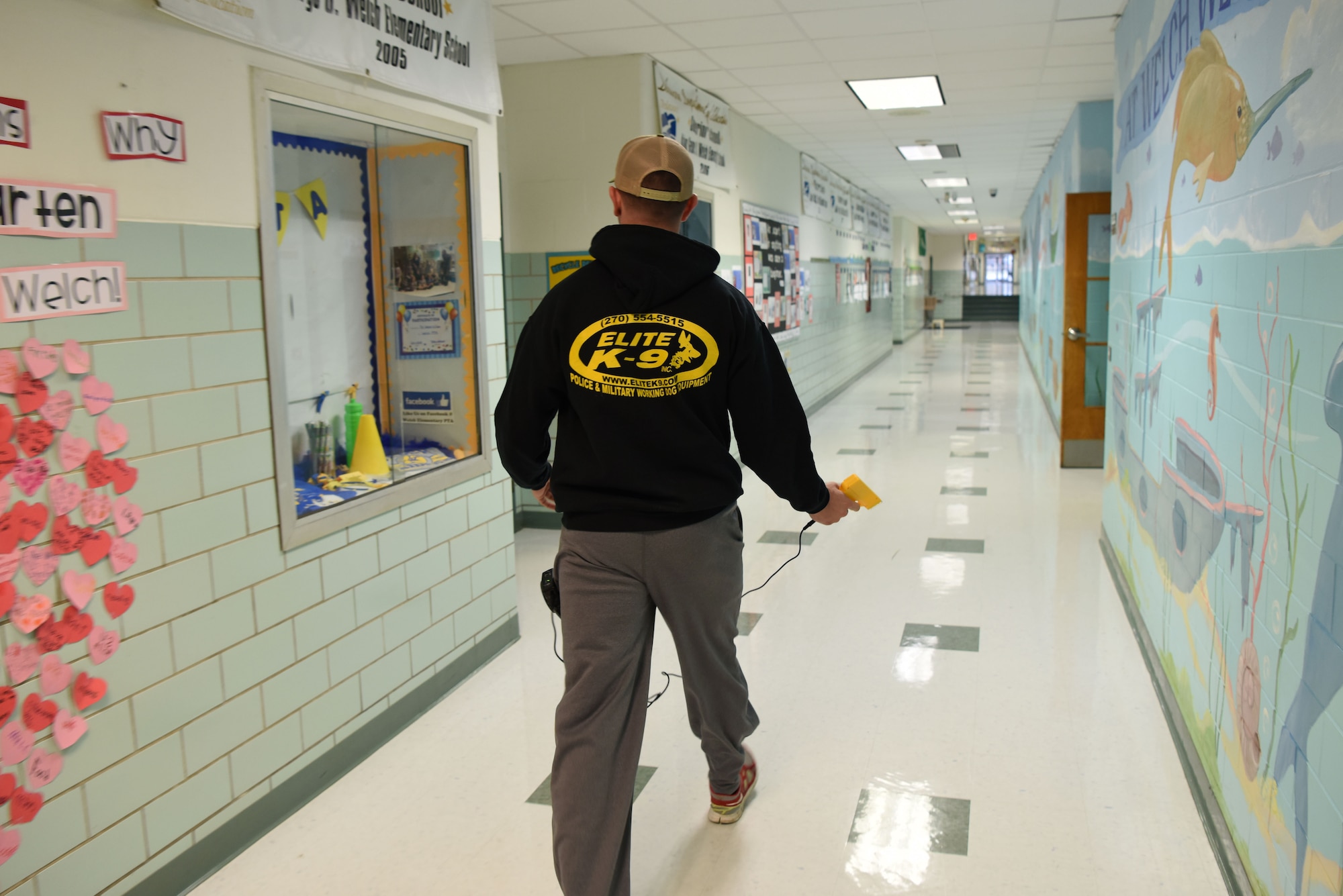 Staff Sgt. Bernard Pecoraro, 436th Security Forces Squadron military working dog handler, acts as a gunman during an active shooter exercise at the George S. Welch Elementary School and Dover Air Force Base Middle School Feb. 26, 2018, on Dover AFB, Del. Air Force and DoD regulations require the base to hold two active shooter exercises per fiscal year. (U.S. Air Force photo by Airman 1st Class Zoe M. Wockenfuss)