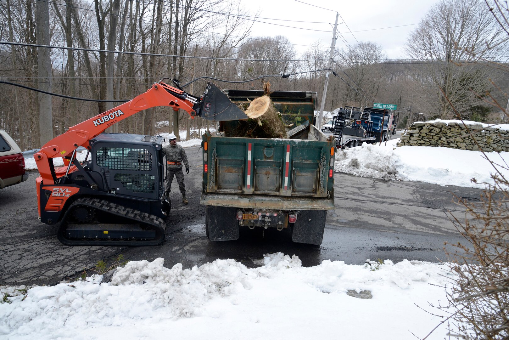 N.Y. Airmen clear debris