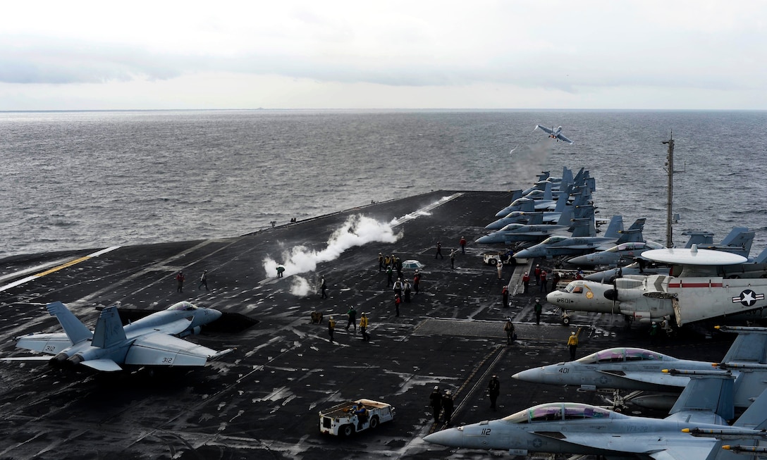 Sailors conduct flight operations.