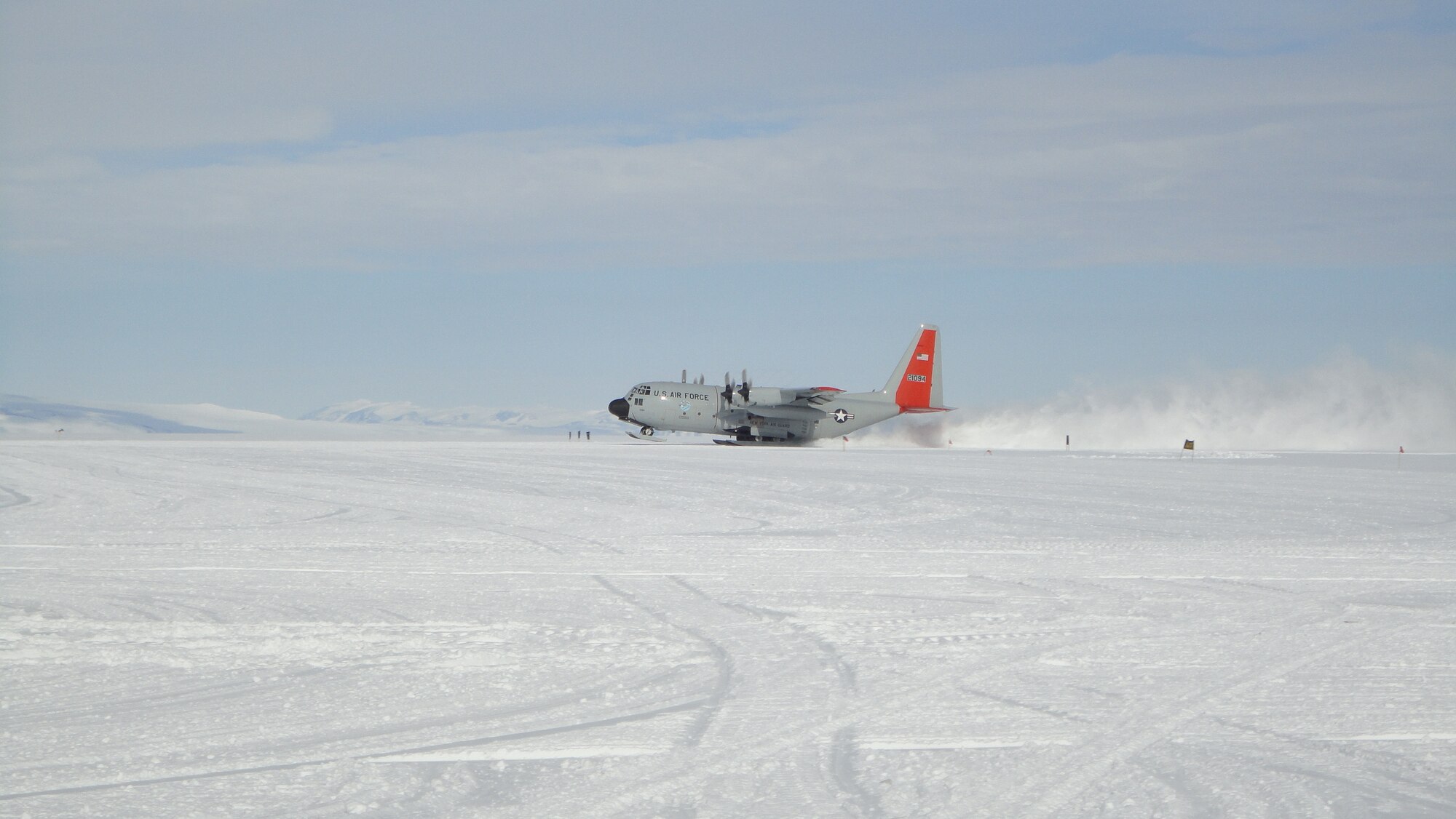 An LC-130 assigned to the New York Air National Guard lands at McMurdo Station in Antarctica Jan. 25, 2018. Service members from the National Guard, Active Duty and Reserves in the U.S. Air Force, Army, Navy and U.S. Coast Guard support Operation Deep Freeze, an inter-agency, multi-national research and investigative mission run by the National Science Foundation. (Courtesy Photo)