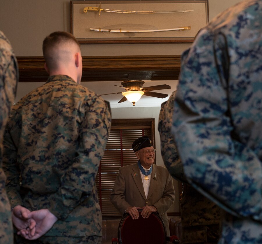 Hershel “Woody” Williams, the last living Medal of Honor recipient from the Battle of Iwo Jima and retired Marine Chief Warrant Officer 4, greet Barracks’ Marines in Center House at Marine Barracks Washington D.C., Feb. 28, 2018. Marines of MBW met with Williams at Center House for a meet and greet and were afforded the opportunity to listen to stories shared from their fellow Marine. Williams received the Medal of Honor for his “valiant devotion to duty” and service above self as he “enabled his company to reach its objective” on the island of Iwo Jima during World War II. (Official Marine Corps photo by Cpl. Robert Knapp/Released)