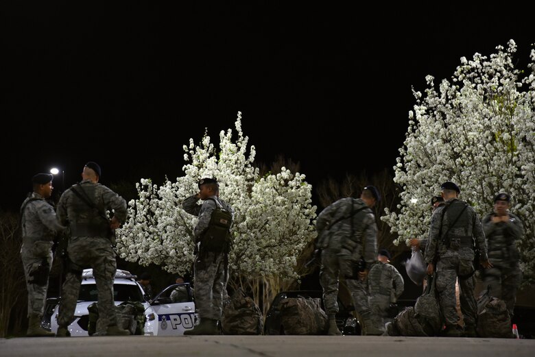U.S. Airmen assigned to the 20th Security Forces Squadron begin their shift at Shaw Air Force Base, S.C., Feb. 26, 2018.