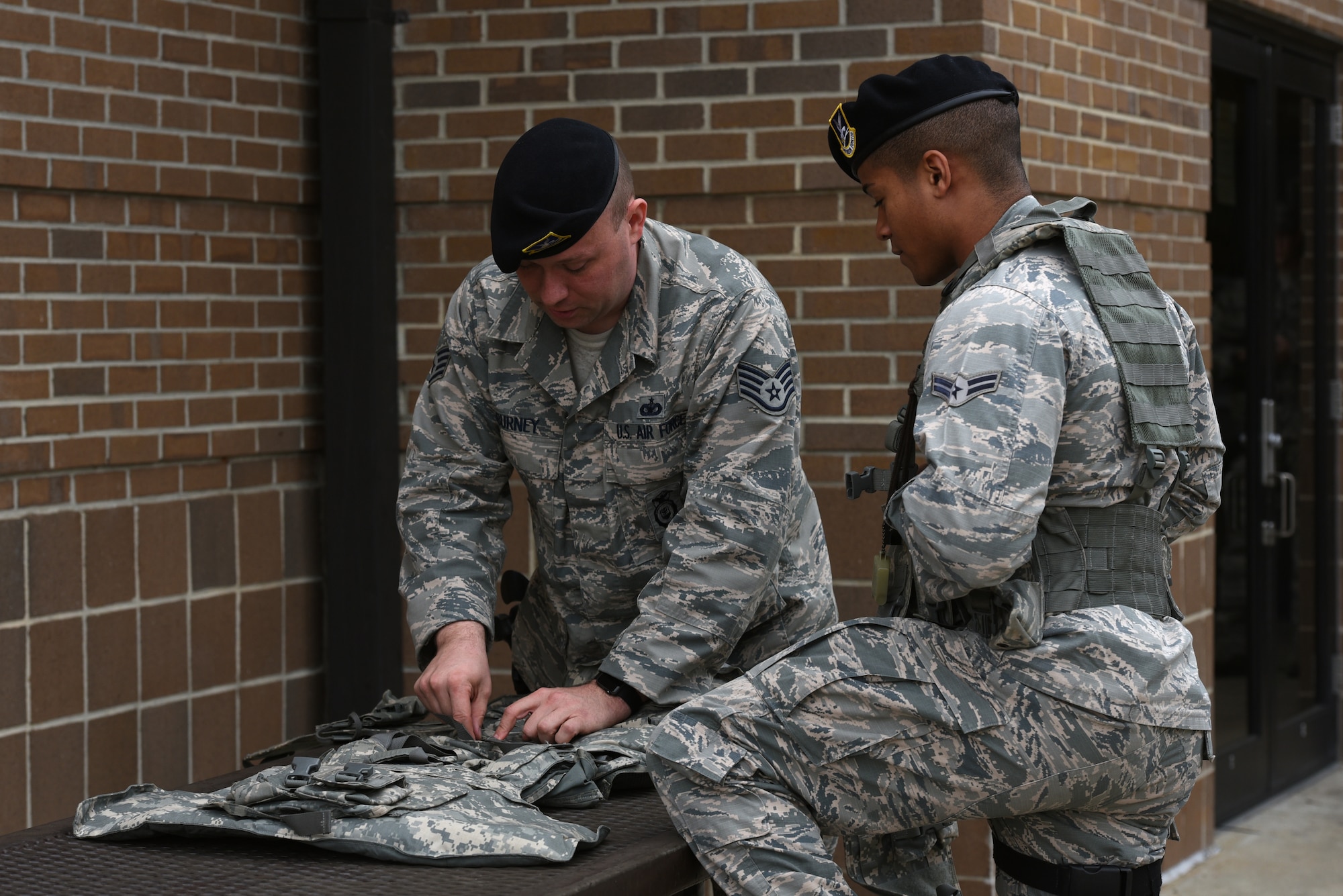 U.S. Air Force Airmen assigned to the 20th Security Forces Squadron prepare equipment before an active shooter exercise at Shaw Air Force Base, S.C., Feb. 28, 2018.