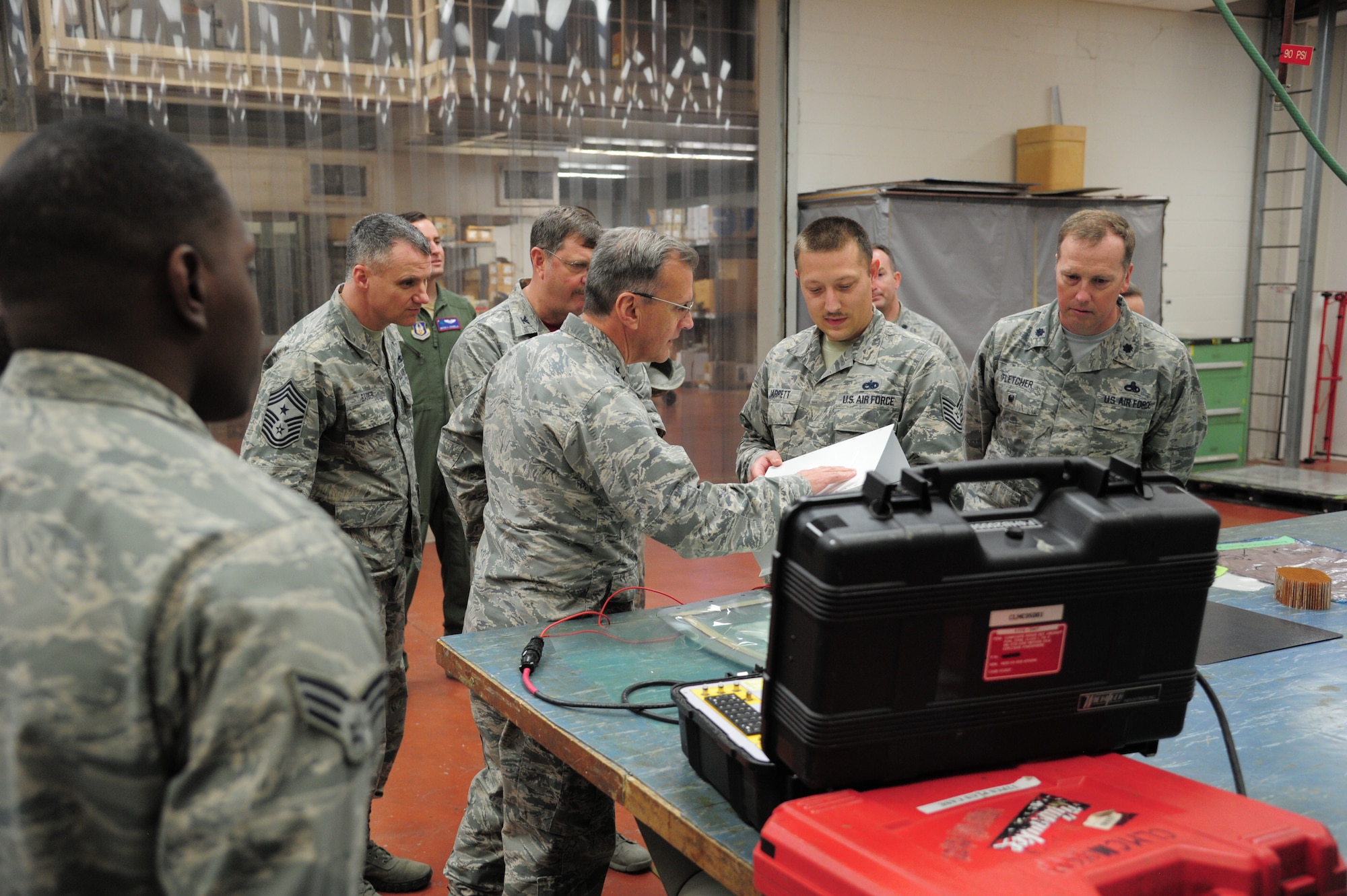 Maj. Gen. Randall A. Ogden, Fourth Air Force commander, inspects an aircraft part with Tech. Sgt. Christopher Jarrett, 315th Maintanence Squadron, during his first visit to Joint Base Charleston, S.C., March 2, 2018. Ogden visited several squadrons during his visit to meet with the Airmen and talk innovation and progress in today's Air Force (U.S. Air Force photo by SrA Jonathan Lane).