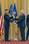 George Carroll III, president of Experimental Aircraft Association Chapter 343, shares the 343rd Bomb Squadron guidon from Lt. Col. John Booker, commander of the 343rd BS, during an honorary commander’s induction ceremony at Barksdale Air Force Base, Louisiana, March 3, 2018.
