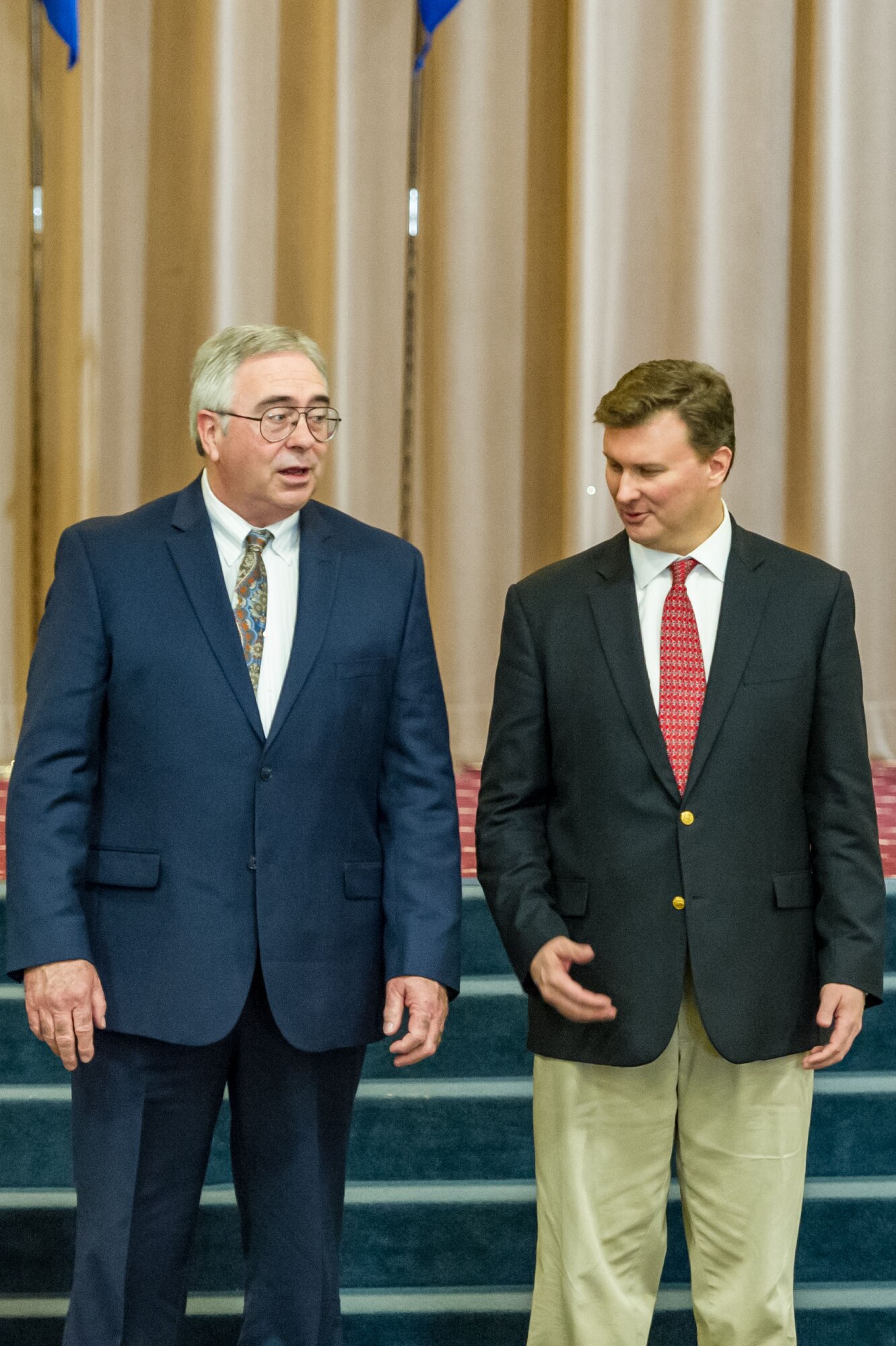 George Carroll III (left), president of Experimental Aircraft Association Chapter 343, stands with Mr. David R. Rockett, Jr. (right), president of Greater Bossier Economic Development Foundation, during an honorary commander’s induction ceremony where both were inducted as honorary commanders of the 343rd Bomb Squadron and 307th Civil Engineer Squadron, respectively, March 3, 2018 on Barksdale Air Force Base, Louisiana.