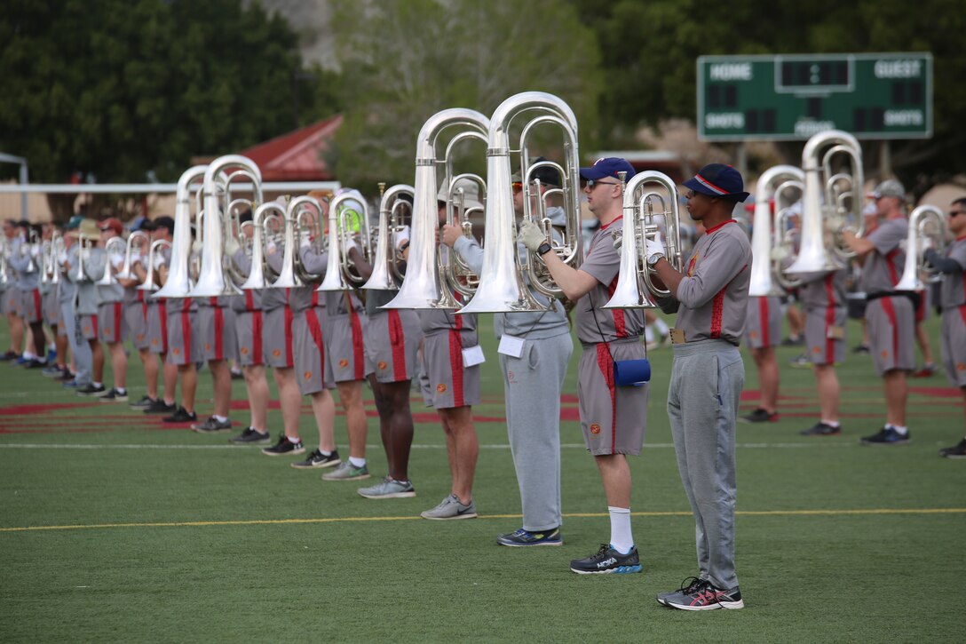 Marines with “The Commandant’s Own,” U.S. Marine Drum & Bugle Corps, practice their drill sequences during the annual Battle Color Detachment training evolution at Marine Corps Air Station Yuma, Az., Feb. 16, 2018. The BCD consists of the Silent Drill Platoon, “The Commandant’s Own,” the United States Marine Drum & Bugle Corps and the Marine Corps Color Guard. The BCD conducts this training in order to refine and reform drill movements and performances for this upcoming West Coast Tour and 2018 parade season. (Official Marine Corps photo by Cpl. Damon Mclean/Released)
