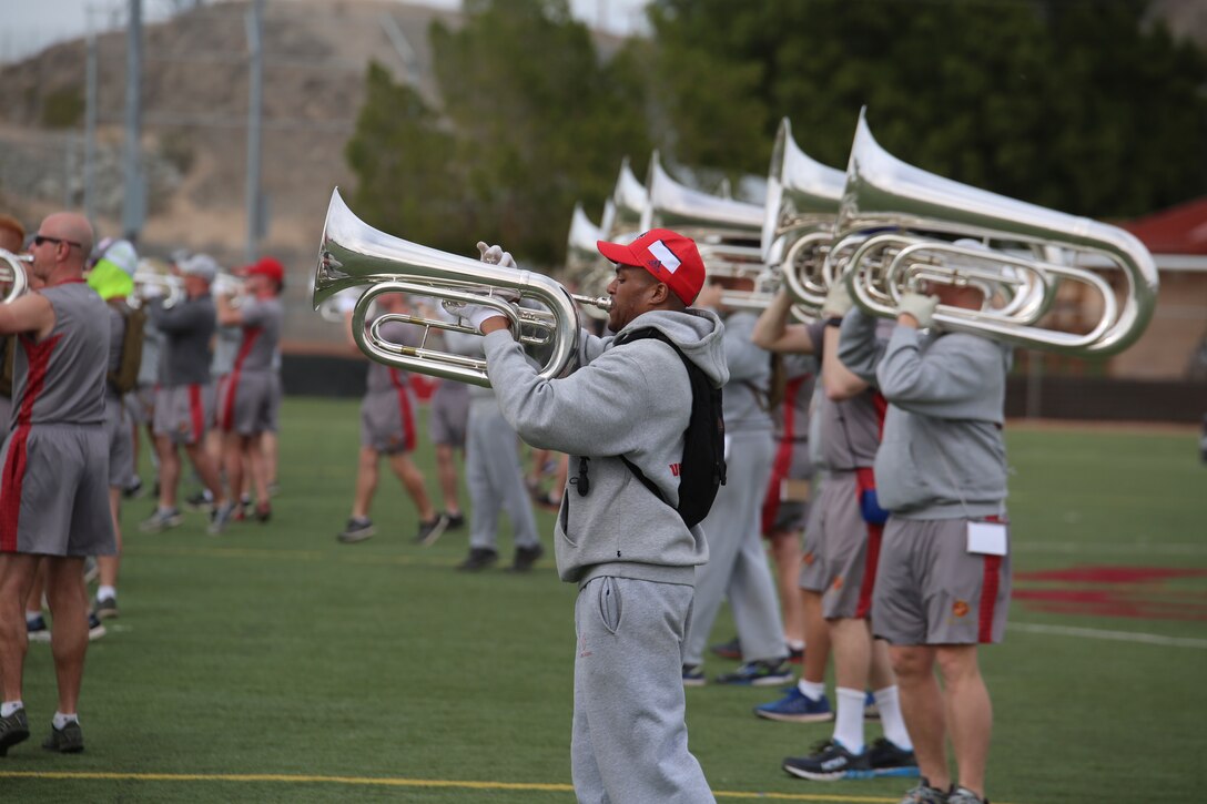 Marines with “The Commandant’s Own,” U.S. Marine Drum & Bugle Corps, practice their drill sequences during the annual Battle Color Detachment training evolution at Marine Corps Air Station Yuma, Az., Feb. 16, 2018. The BCD consists of the Silent Drill Platoon, “The Commandant’s Own,” the United States Marine Drum & Bugle Corps and the Marine Corps Color Guard. The BCD conducts this training in order to refine and reform drill movements and performances for this upcoming West Coast Tour and 2018 parade season. (Official Marine Corps photo by Cpl. Damon Mclean/Released)