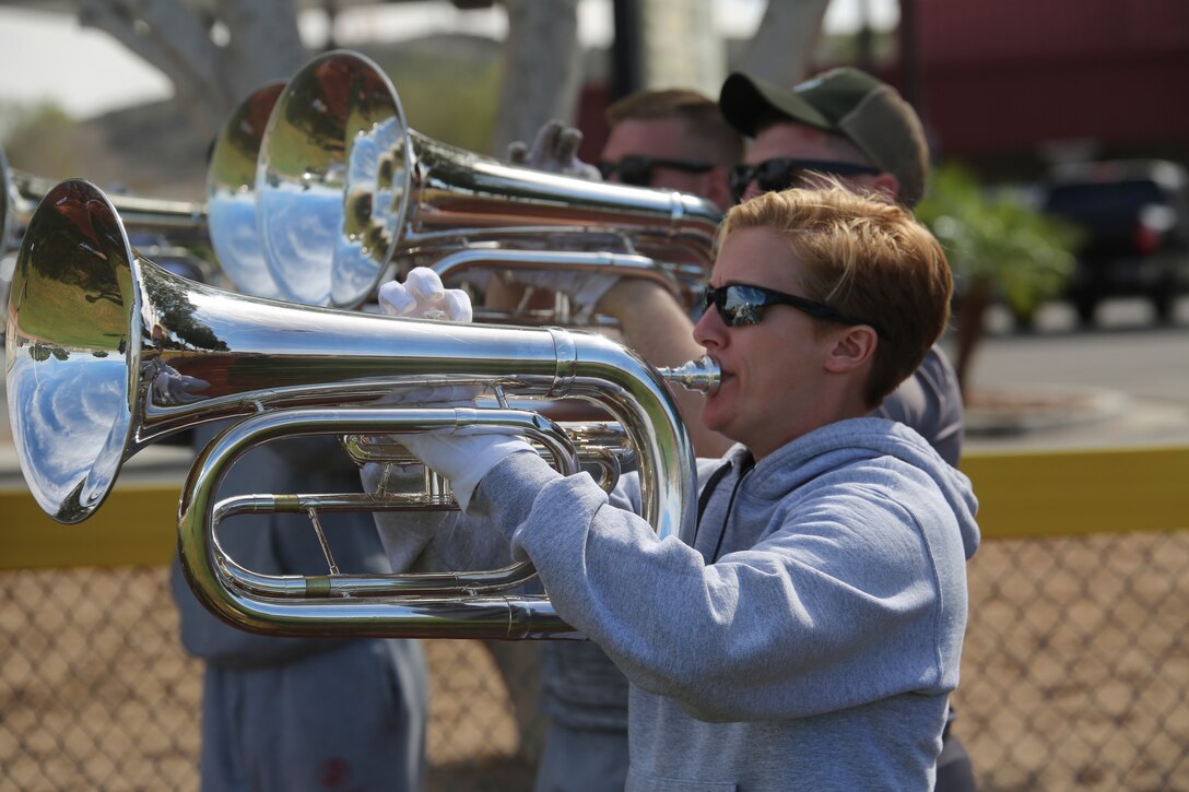 Marines with “The Commandant’s Own,” U.S.  Marine Drum & Bugle Corps, practice their drill sequences during the annual Battle Color Detachment training evolution at Marine Corps Air Station Yuma, Az., Feb. 16, 2018. The BCD consists of the Silent Drill Platoon, “The Commandant’s Own,” the United States Marine Drum & Bugle Corps and the Marine Corps Color Guard. The BCD conducts this training in order to refine and reform drill movements and performances for this upcoming West Coast Tour and 2018 parade season. (Official Marine Corps photo by Cpl. Damon A. Mclean/Released)